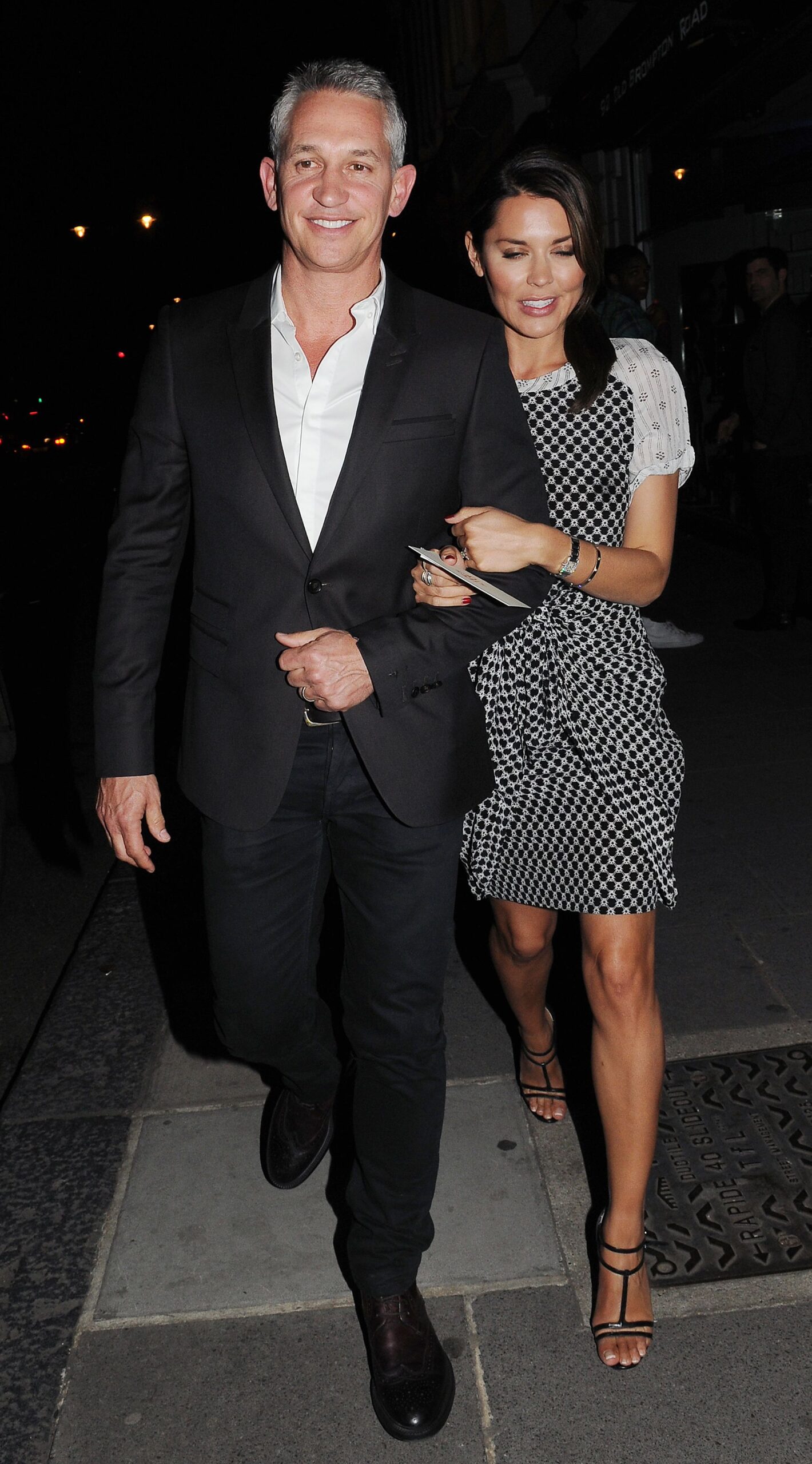 Gary Lineker and ex-wife Danielle Bux walking hand in hand 