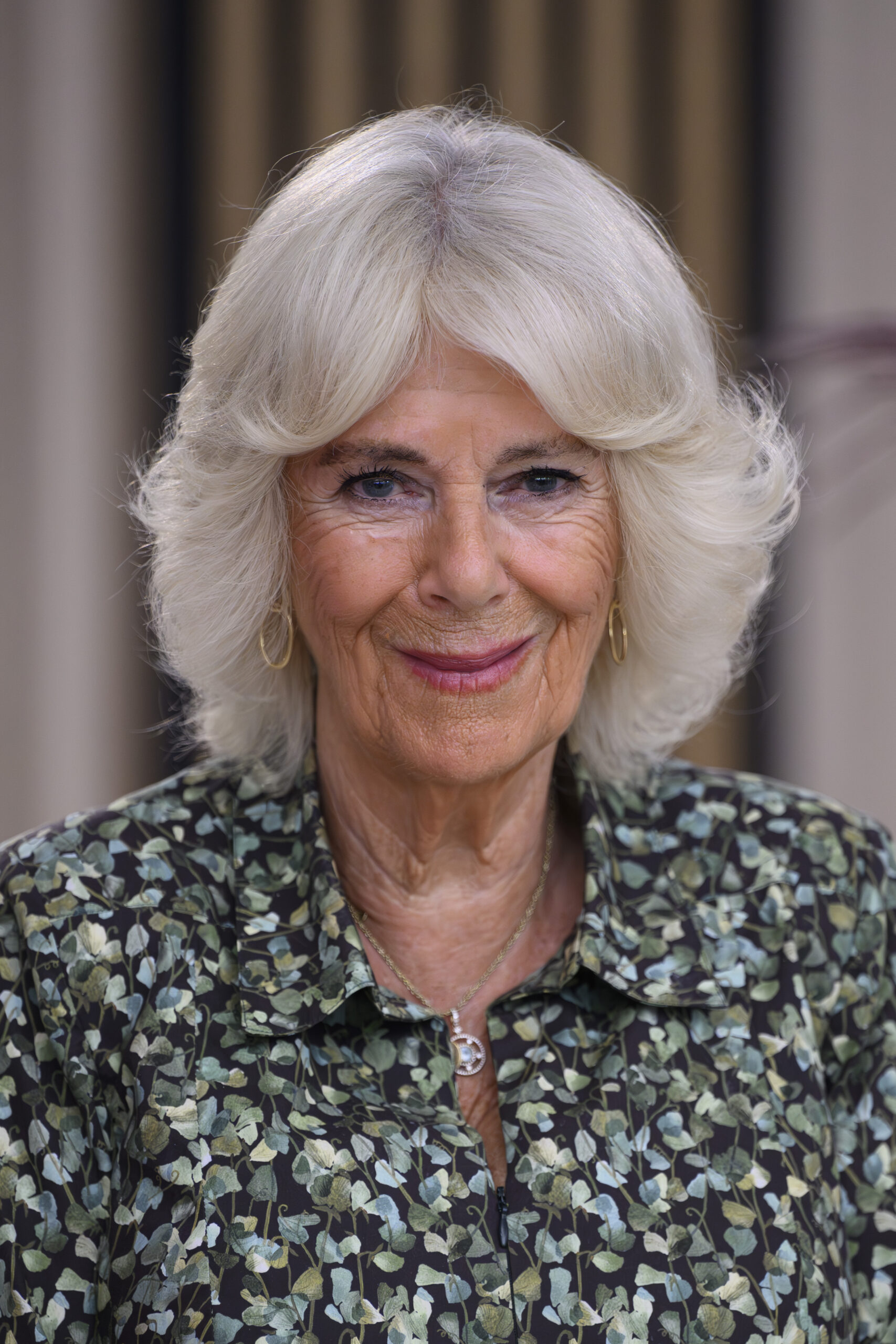 Queen Camilla smiling during royal engagement