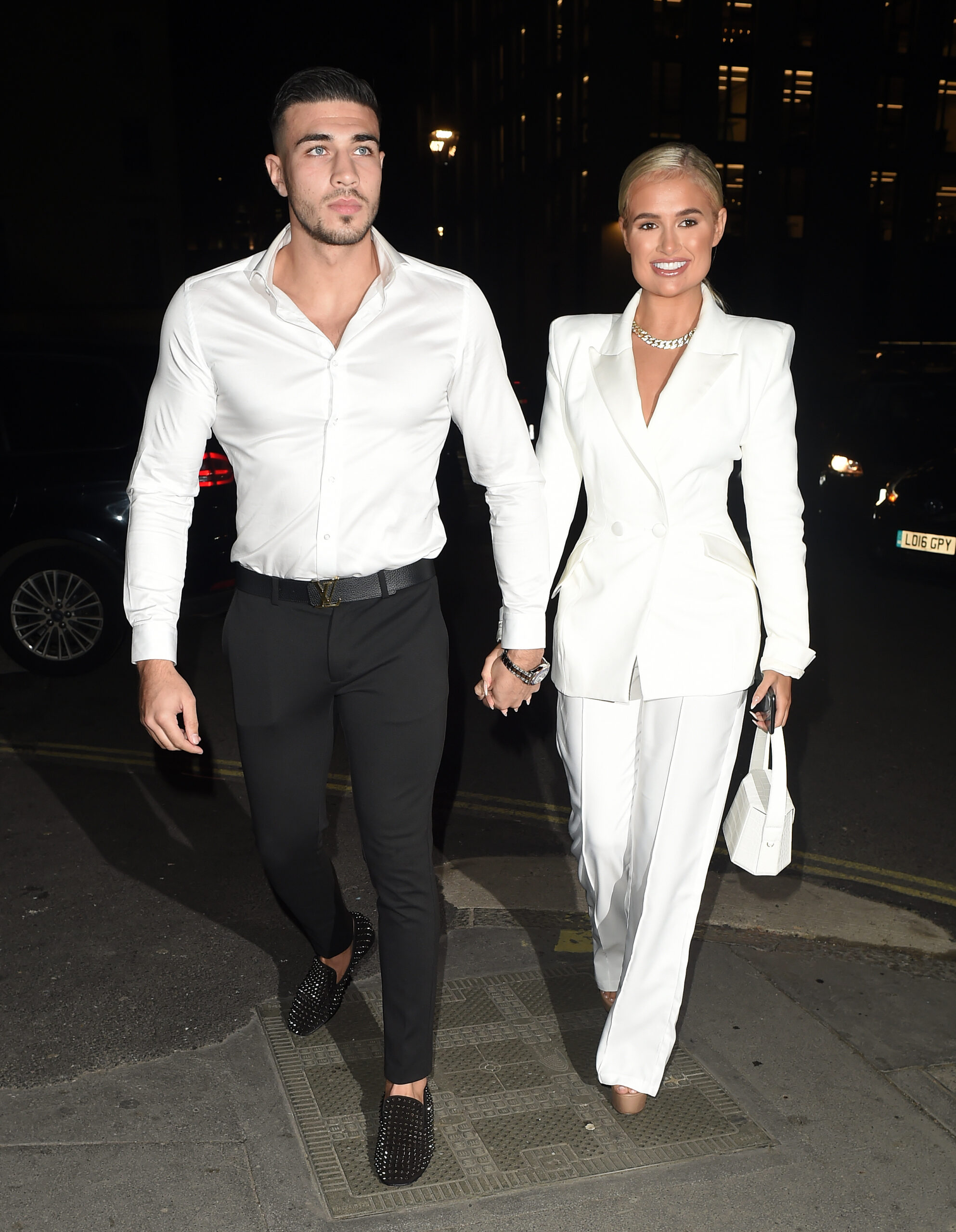 Molly-Mae and Tommy Fury walk hand-in-hand at Amber x Miss Pap launch party