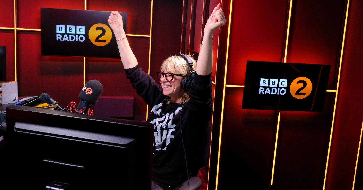 Zoe Ball punching the air on BBC Radio 2 