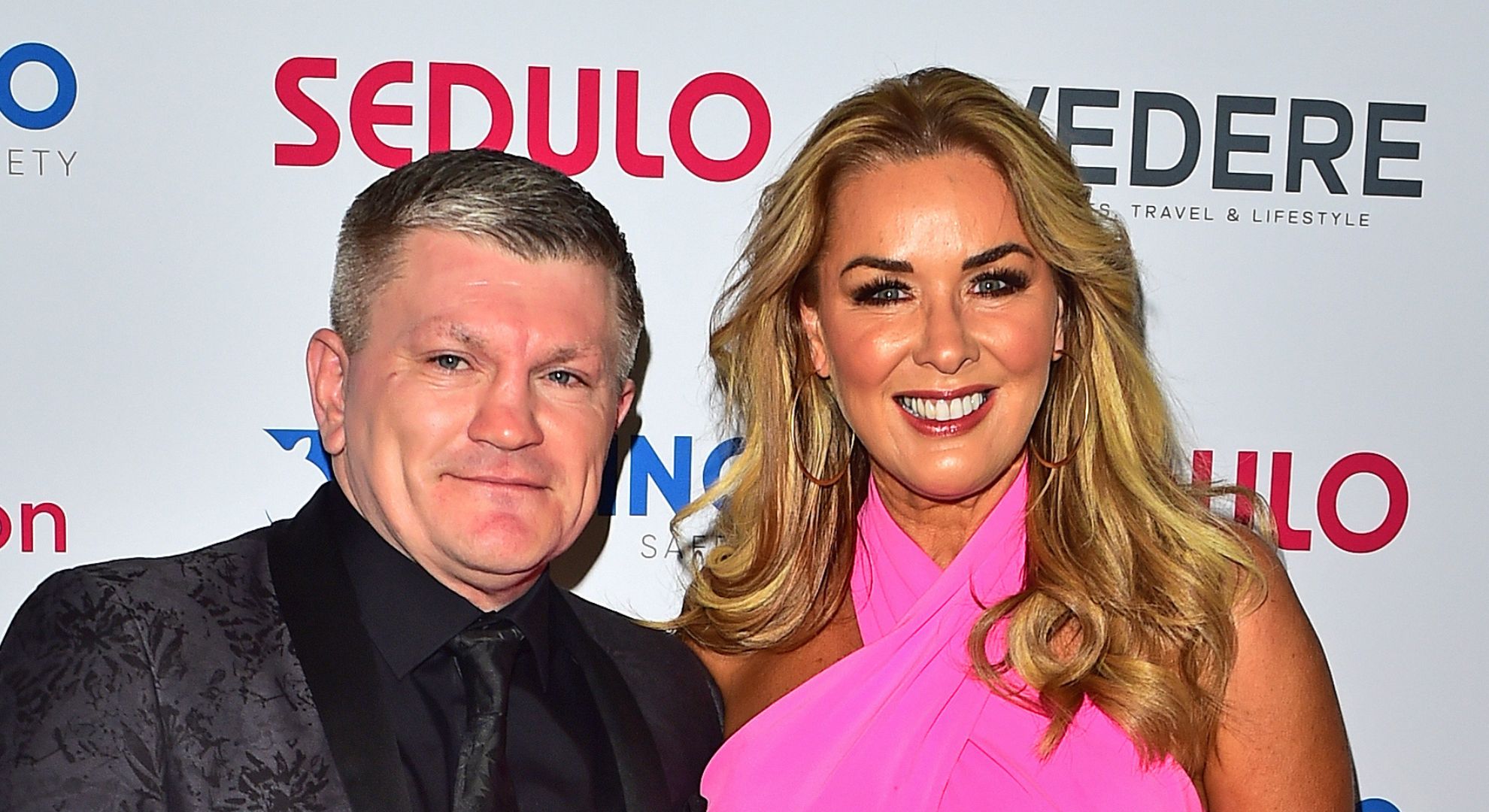 Claire and Ricky smiling