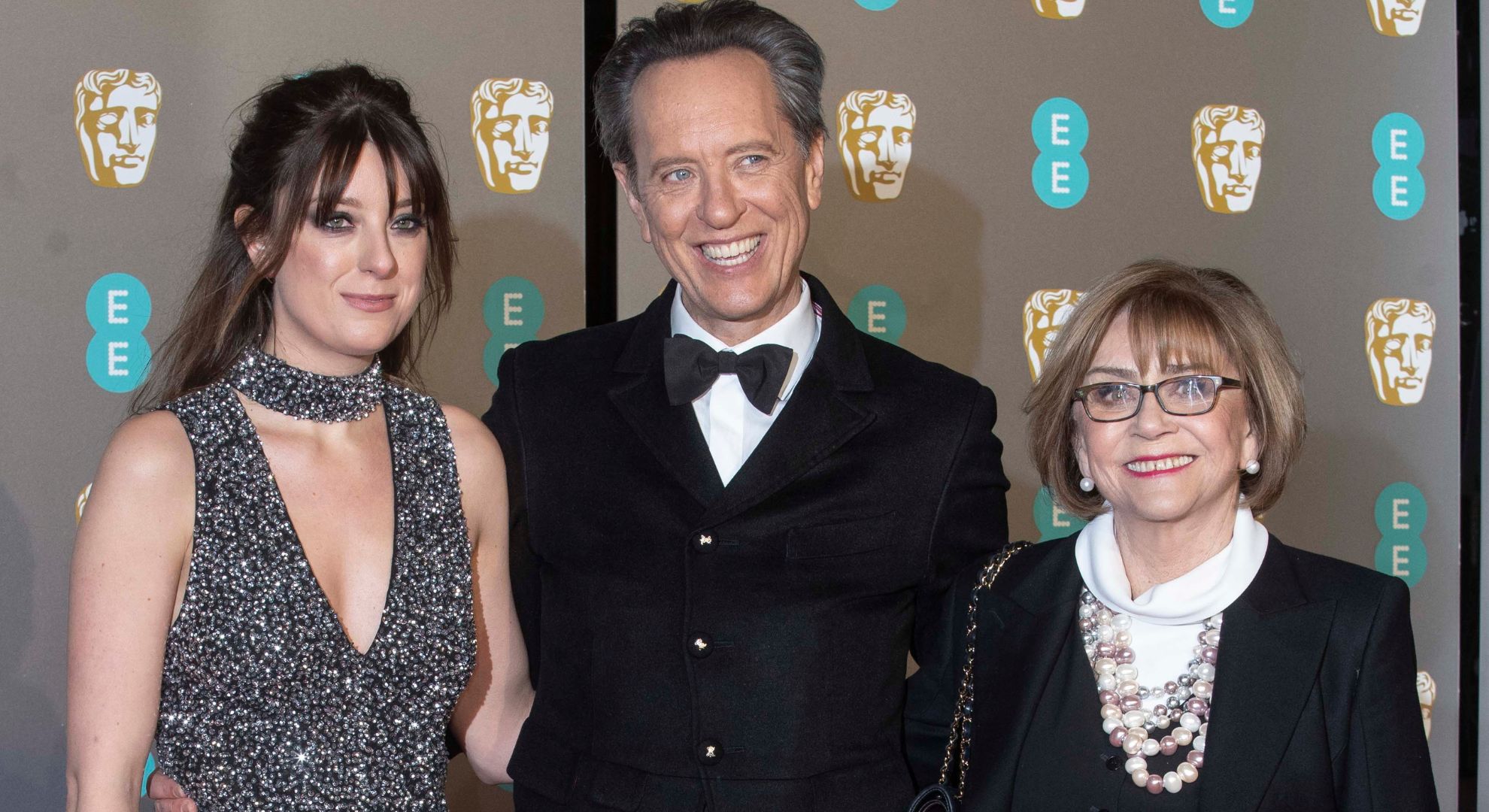 Richard E Grant and his wife and daughter