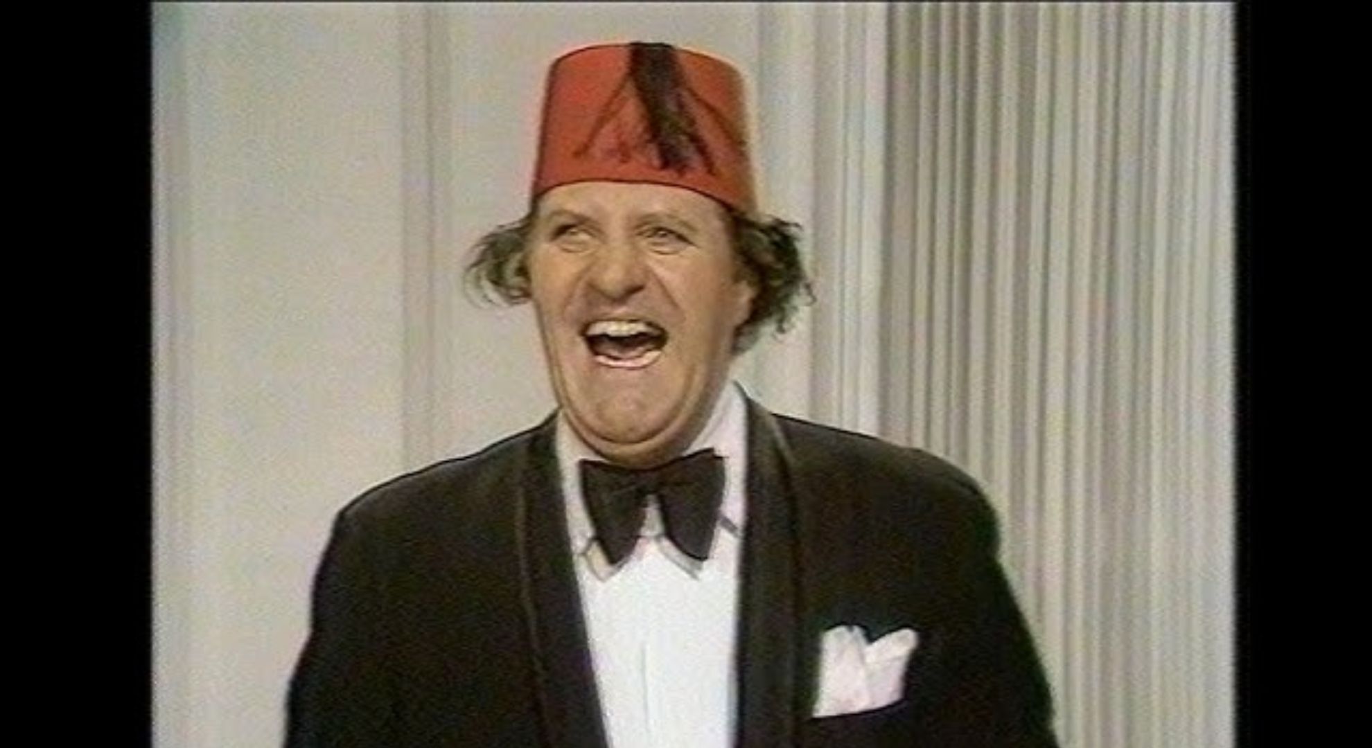 Tommy Cooper on stage
