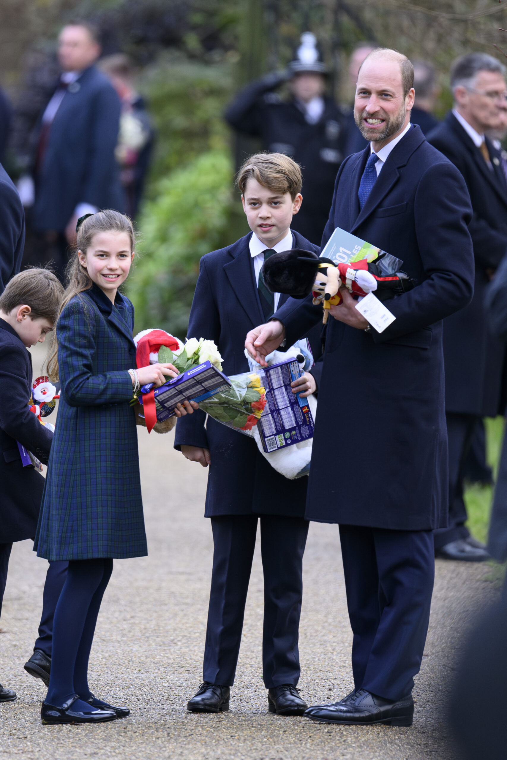 Prince Louis, Princess Charlotte, Prince George and Prince William on Christmas Day walkabout