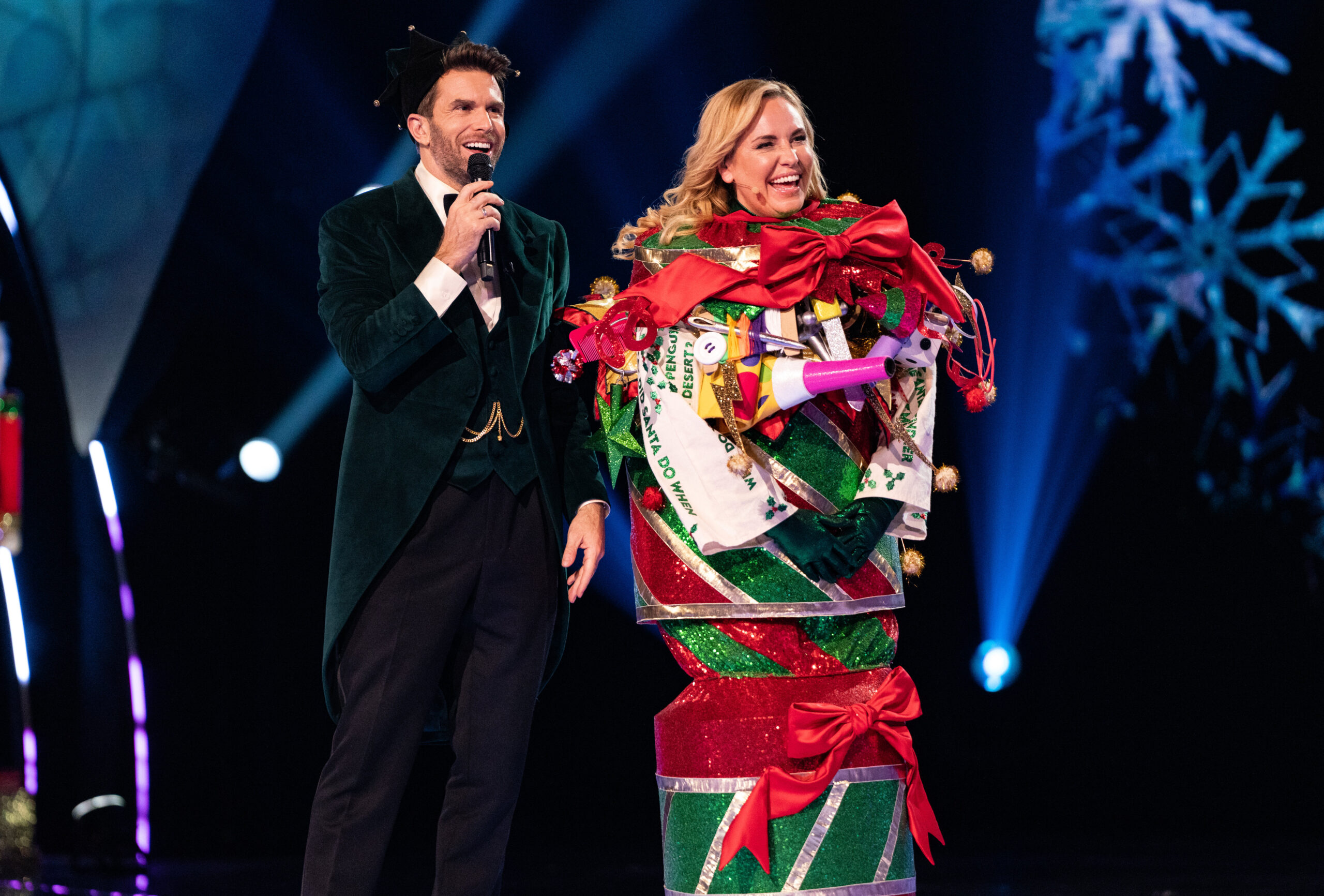Josie Gibson as Cracker on The Masked Singer Christmas special alongside Joel Dommett