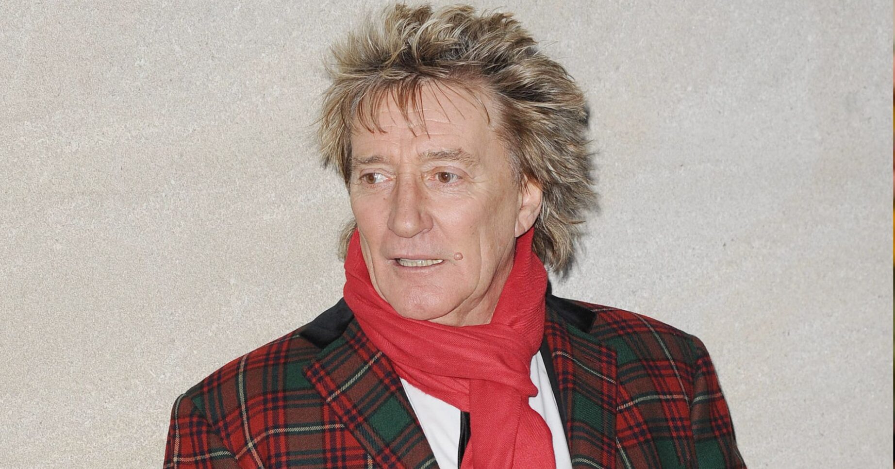 Sir Rod Stewart in tartan outfit