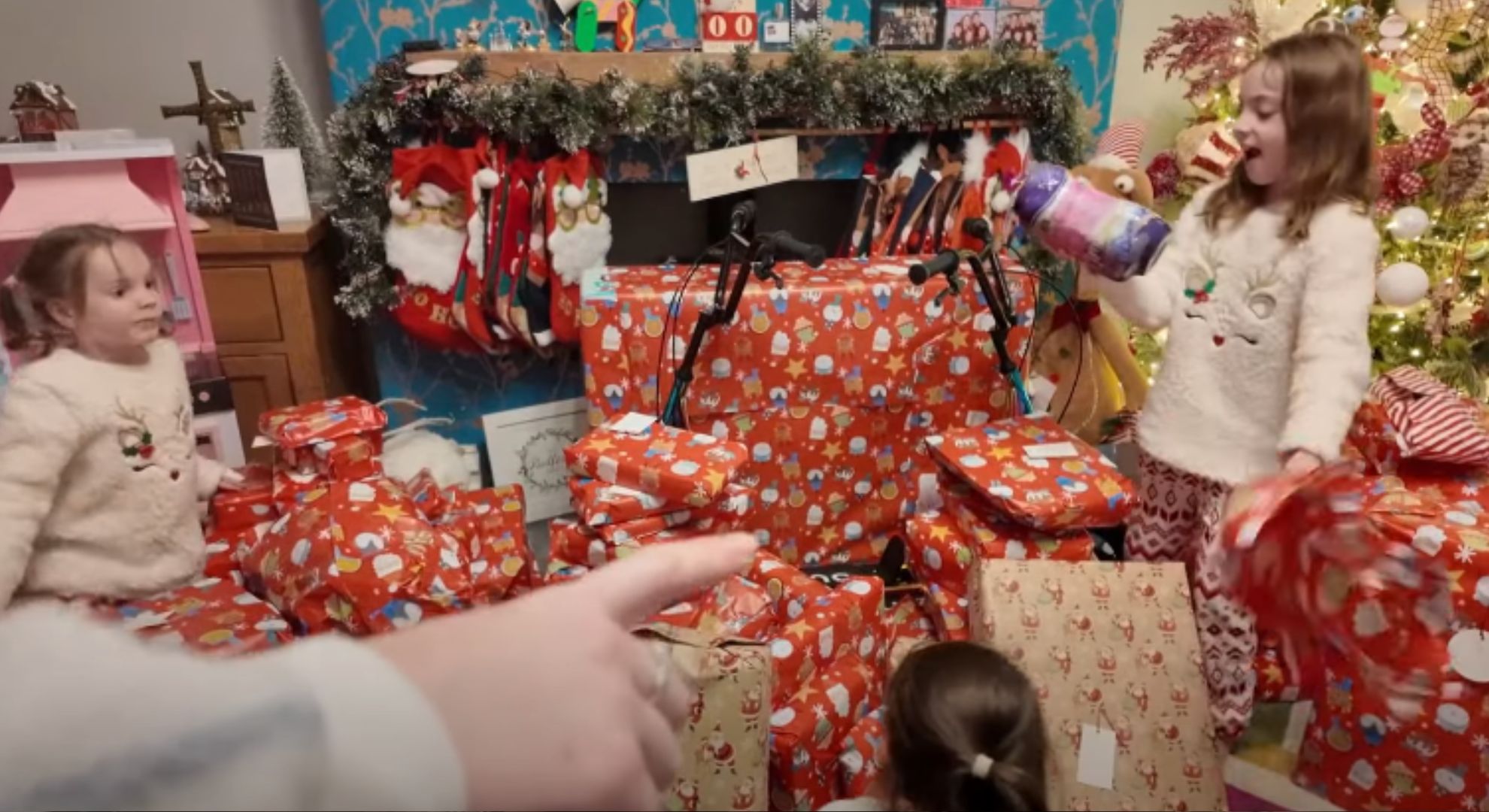 The Radford family children opening presents on Christmas morning