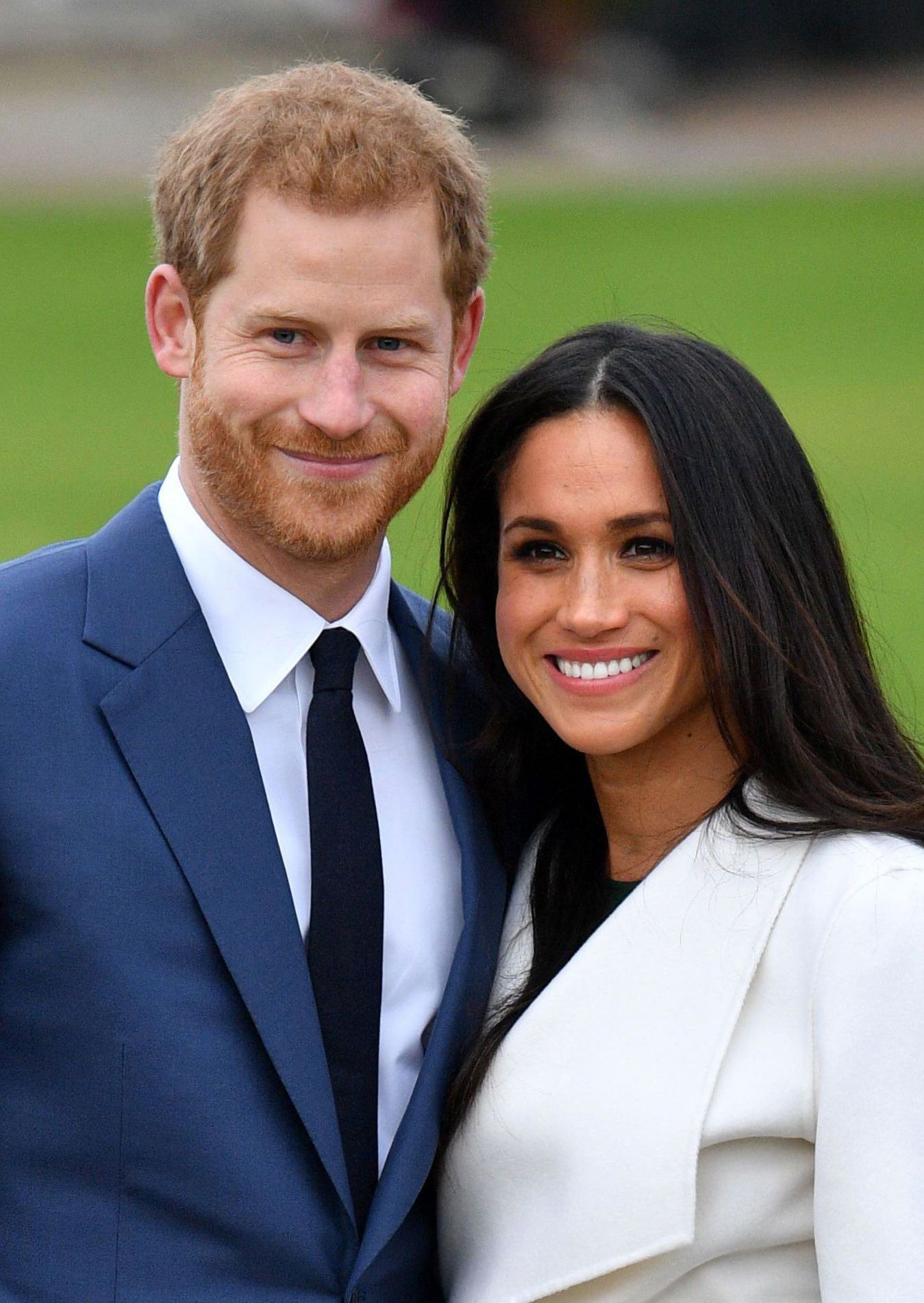 Prince Harry and Meghan markle smiling