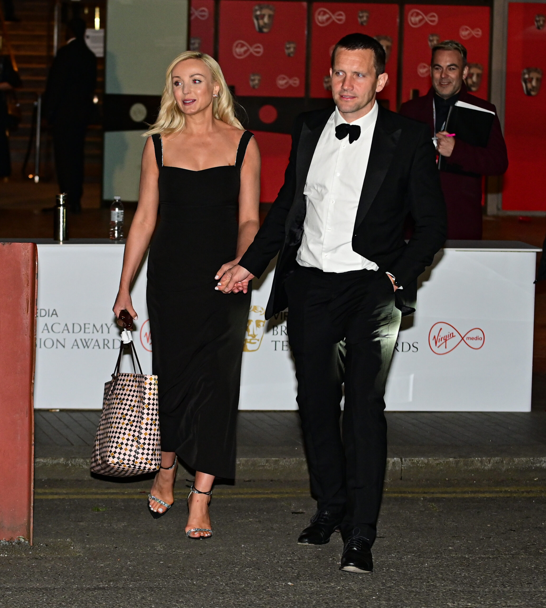 Helen George and Jack Ashton holding hands
