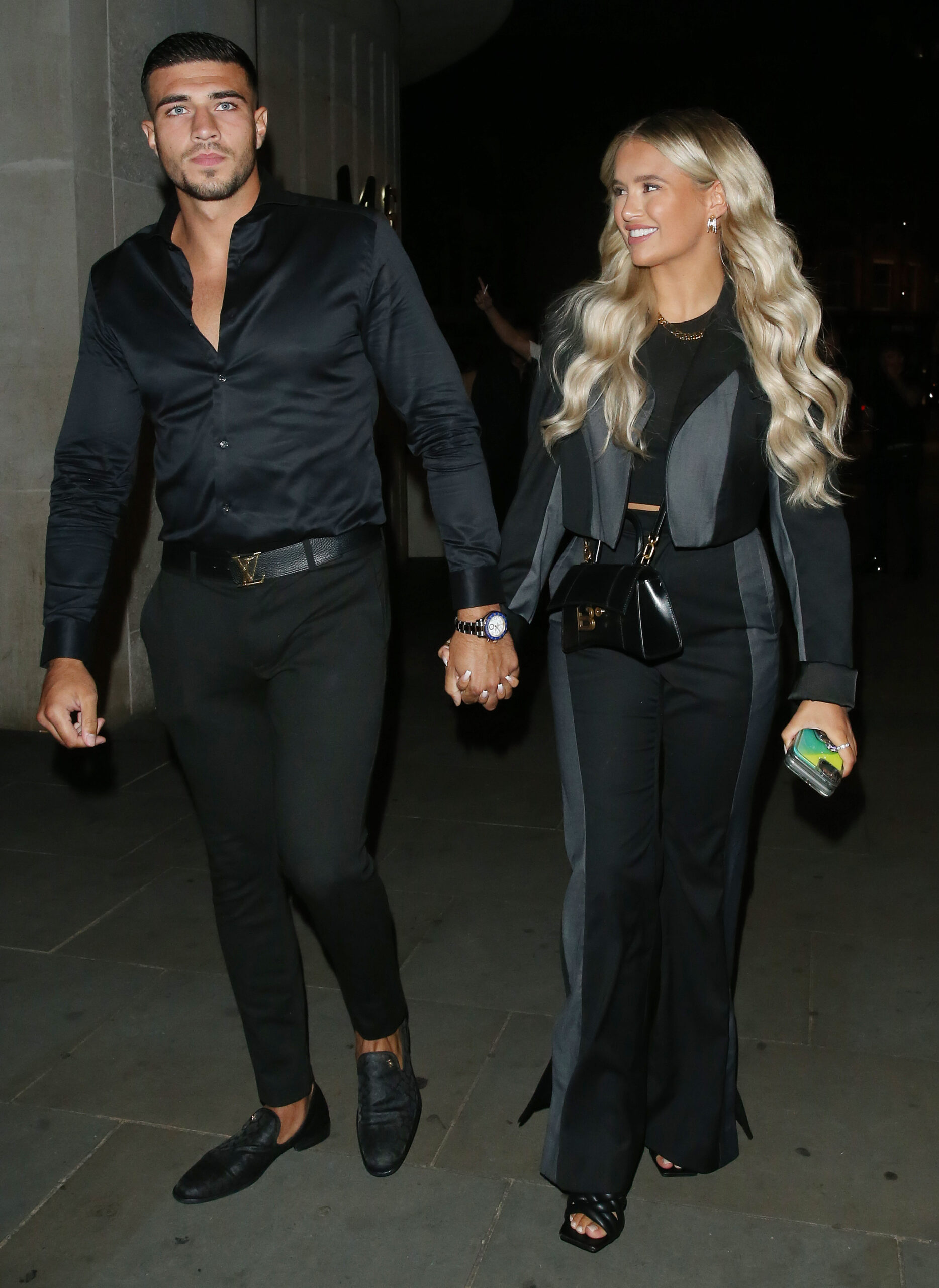 Molly-Mae Hague and Tommy Fury holding hands