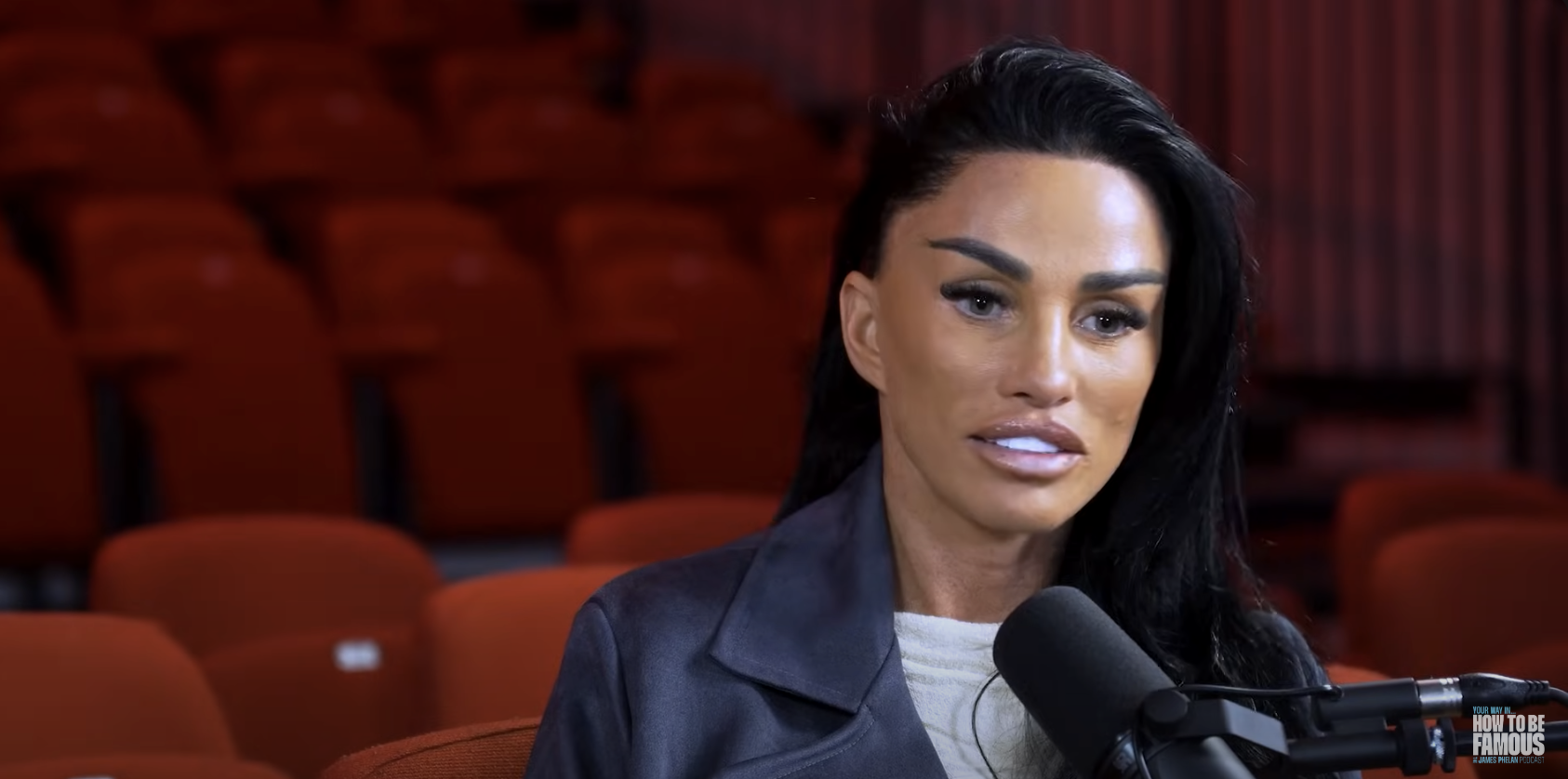 Katie Price wears a white t-shirt and black leather jacket