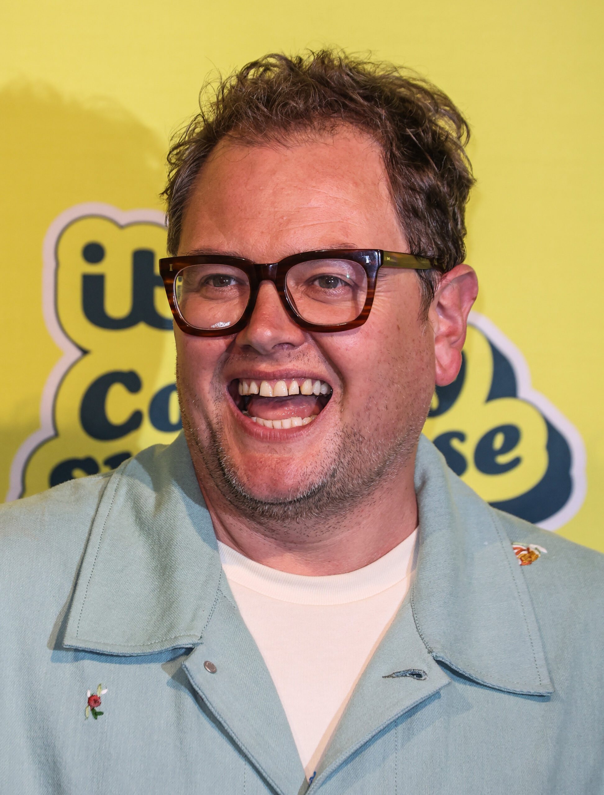 Alan Carr smiling
