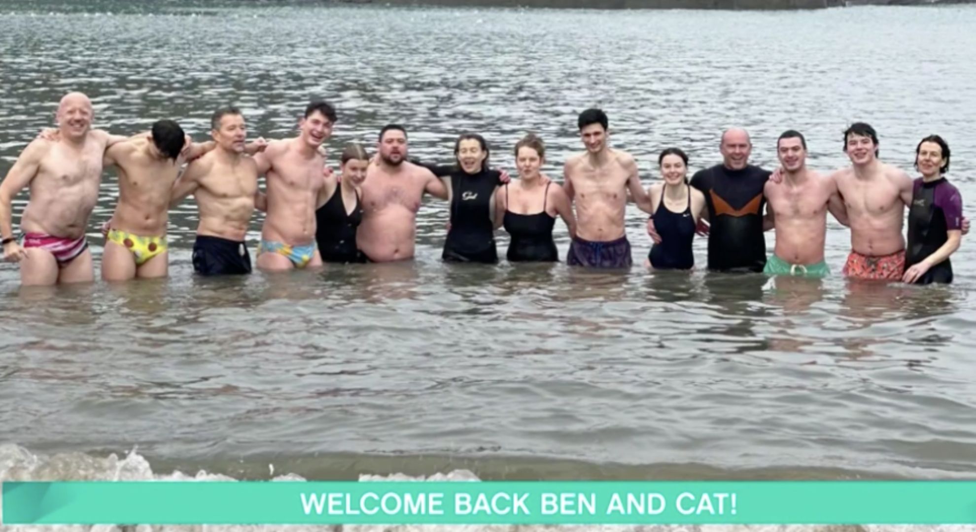 Ben and his family in a lake