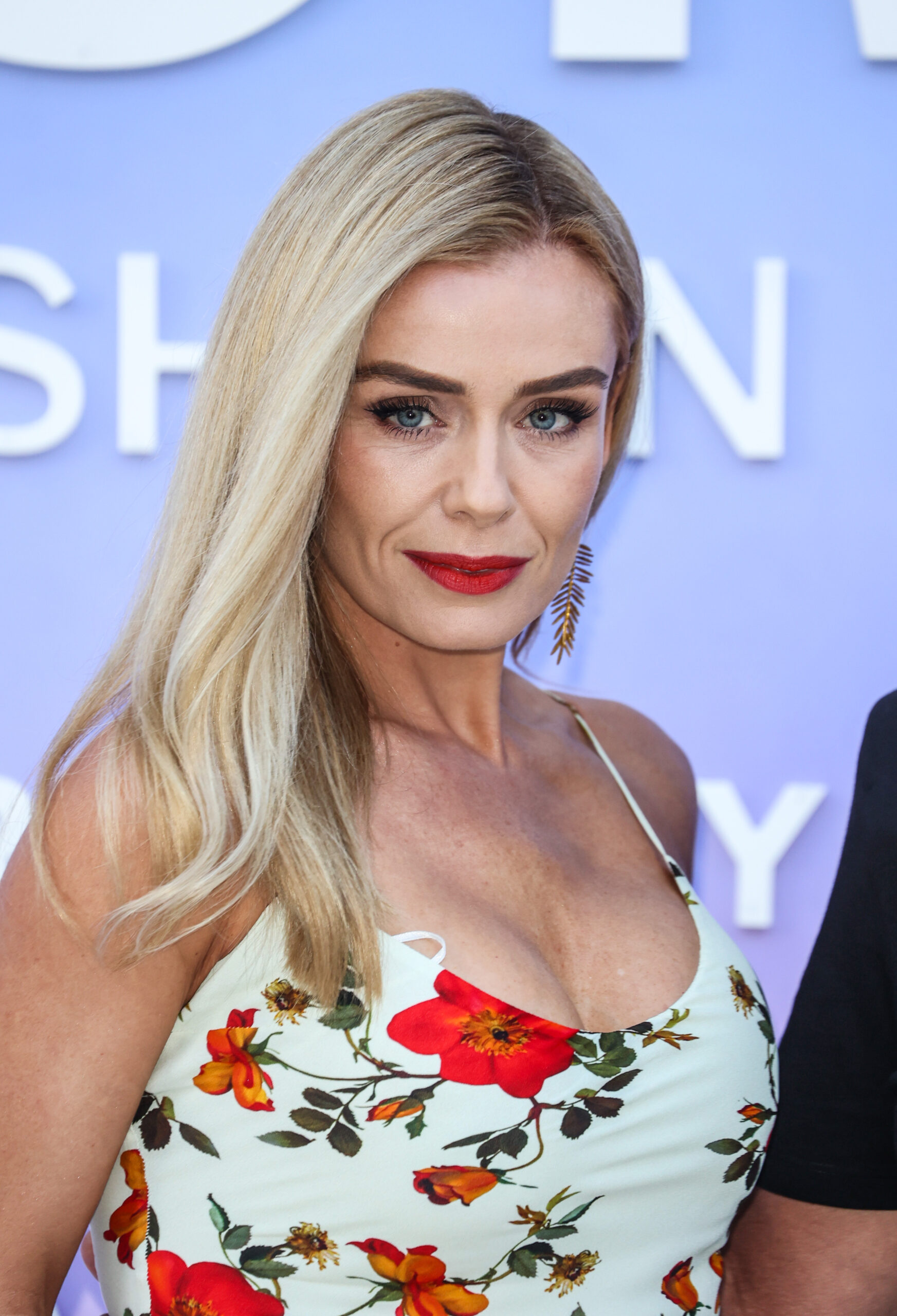 Katherine Jenkins smiling in a floral dress
