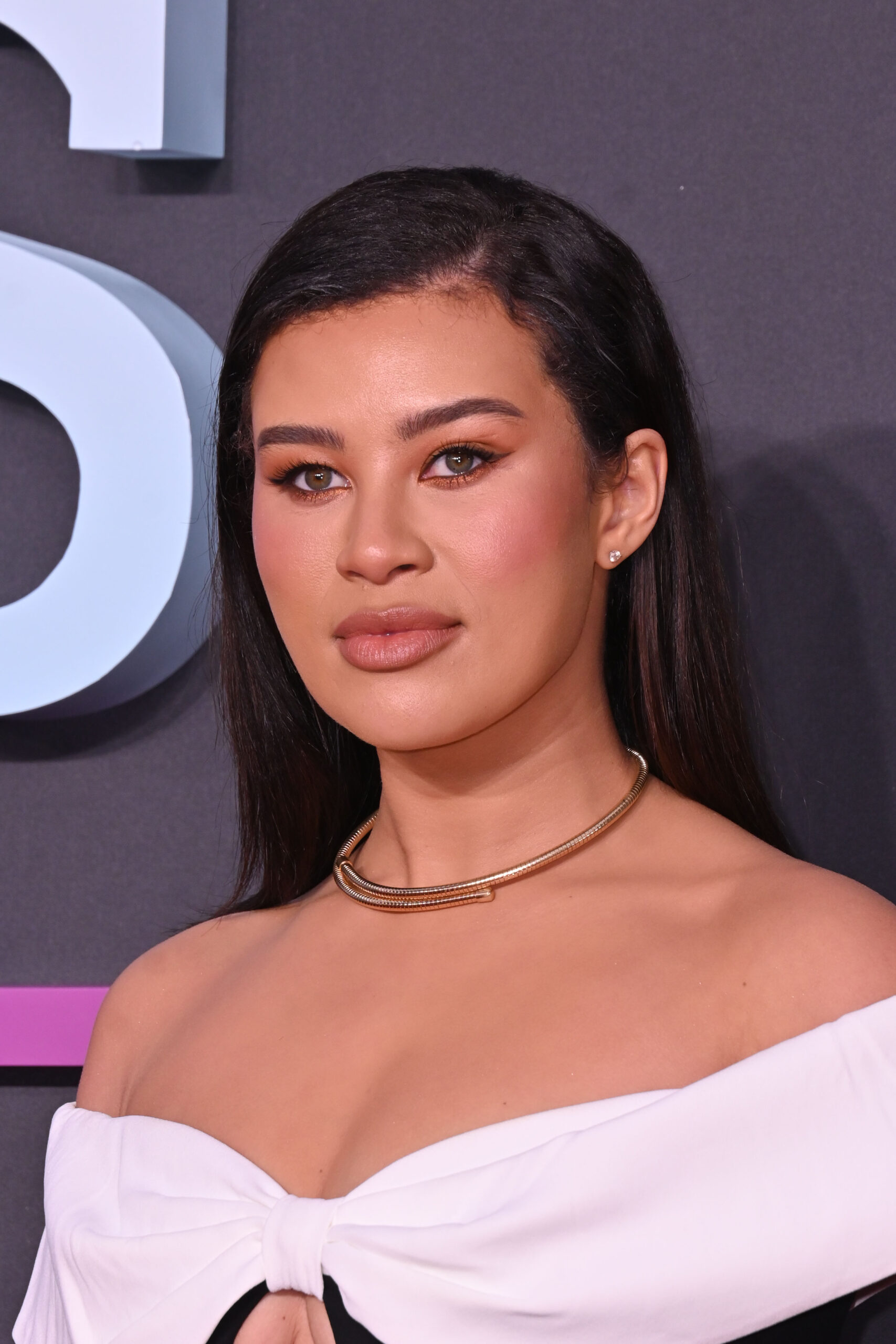 Montana Brown posing on the red carpet 