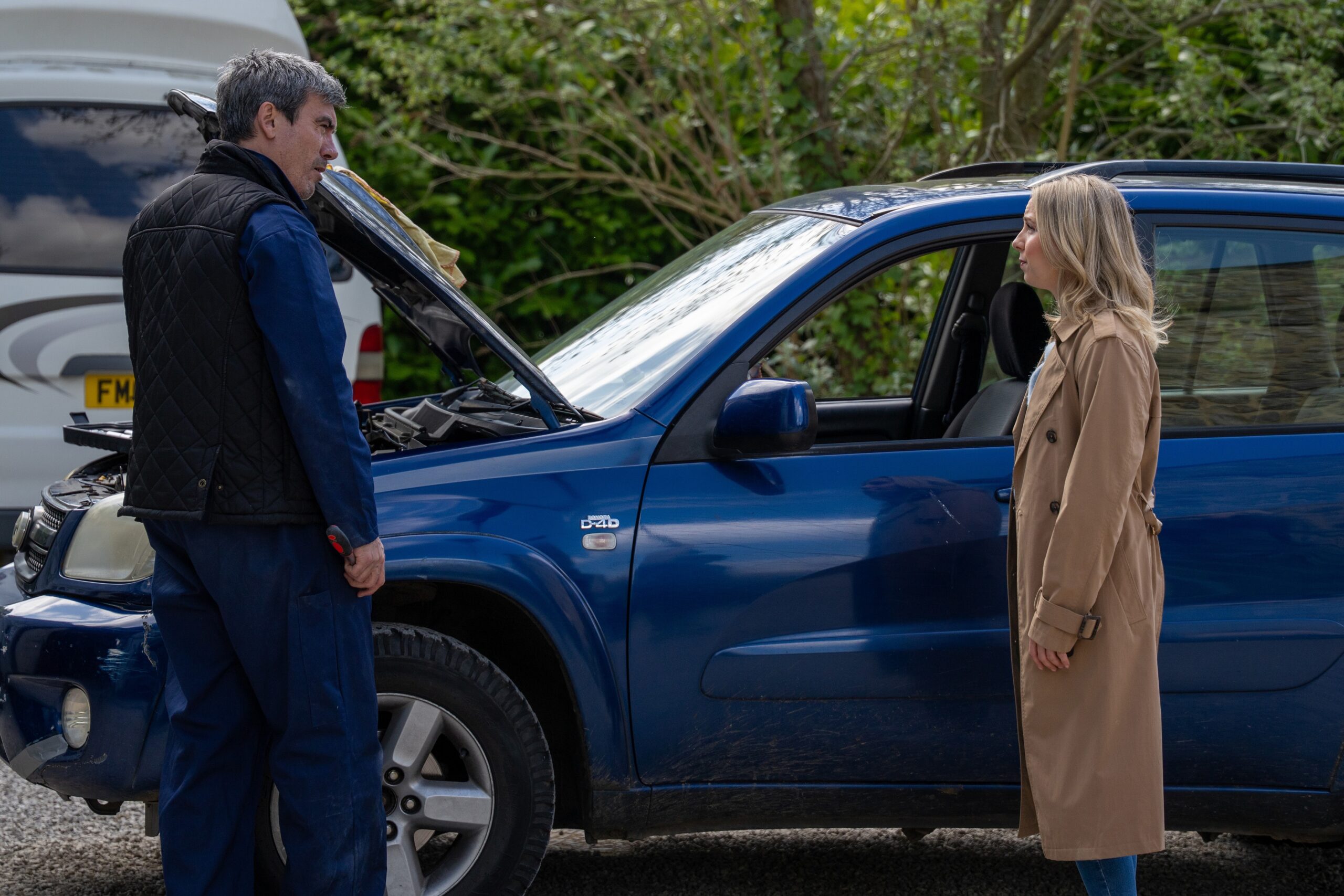 Belle and Cain talking outside