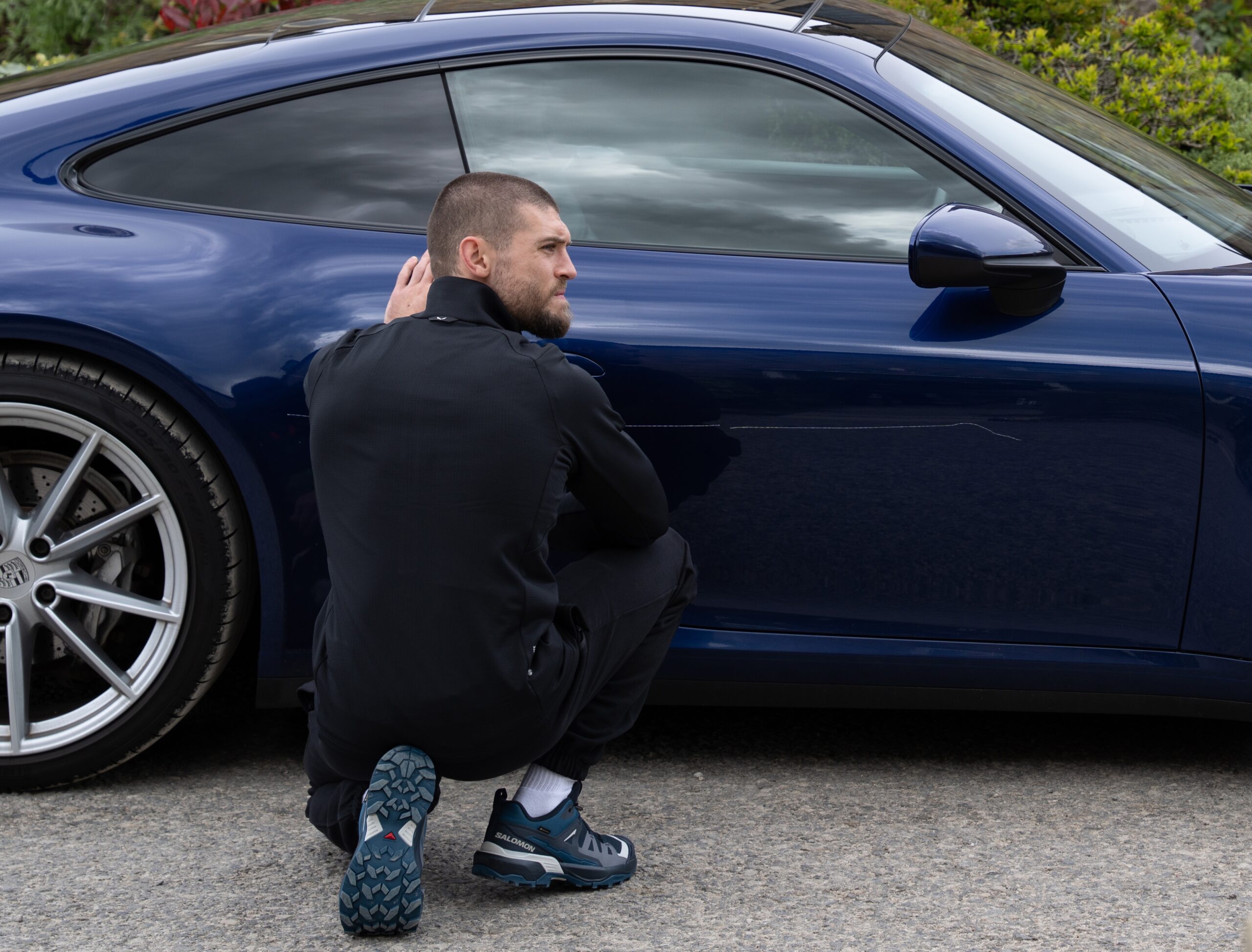 Joe next to keyed car