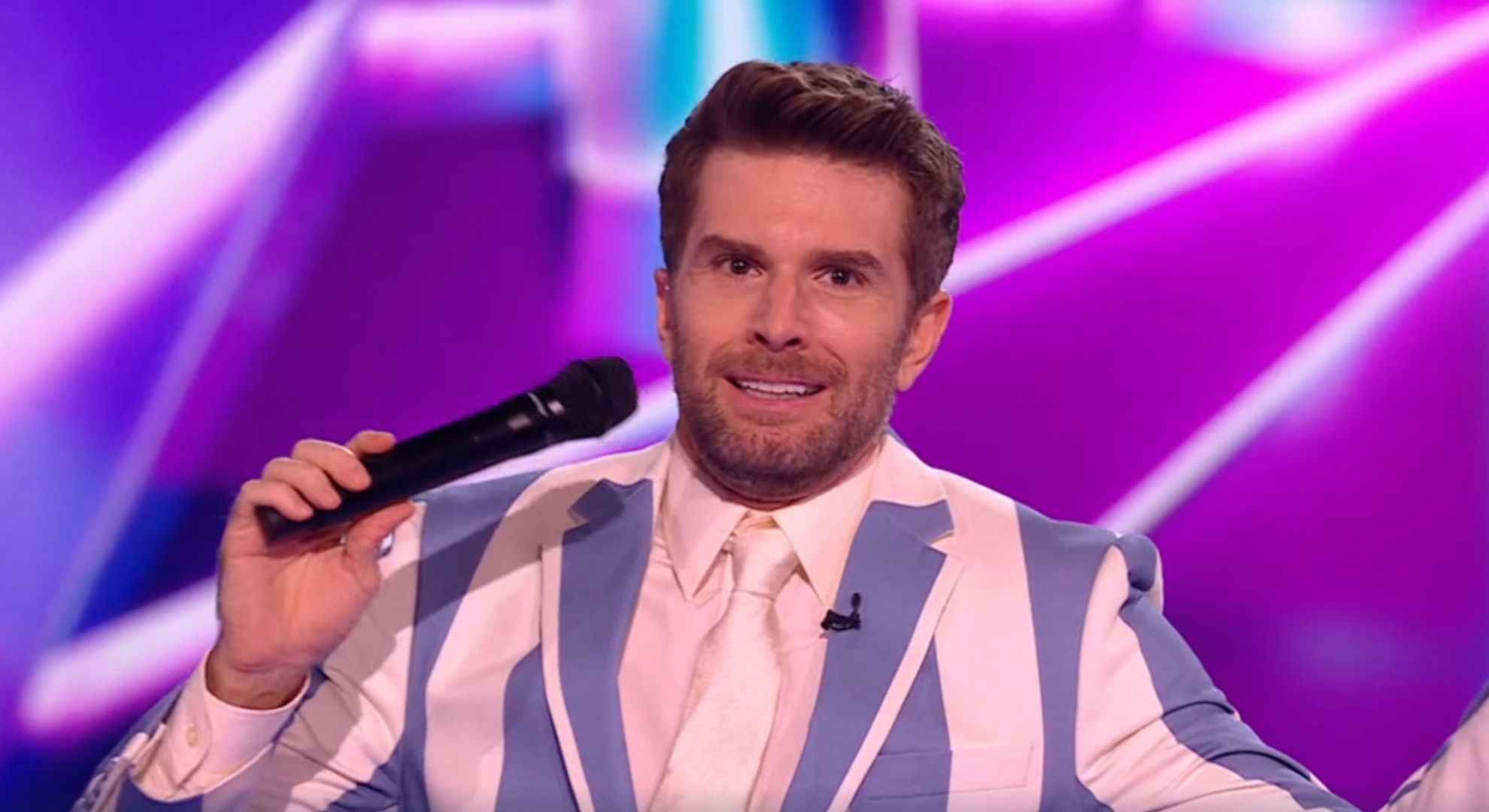 Joel Dommett looking awkward on The Masked Singer 