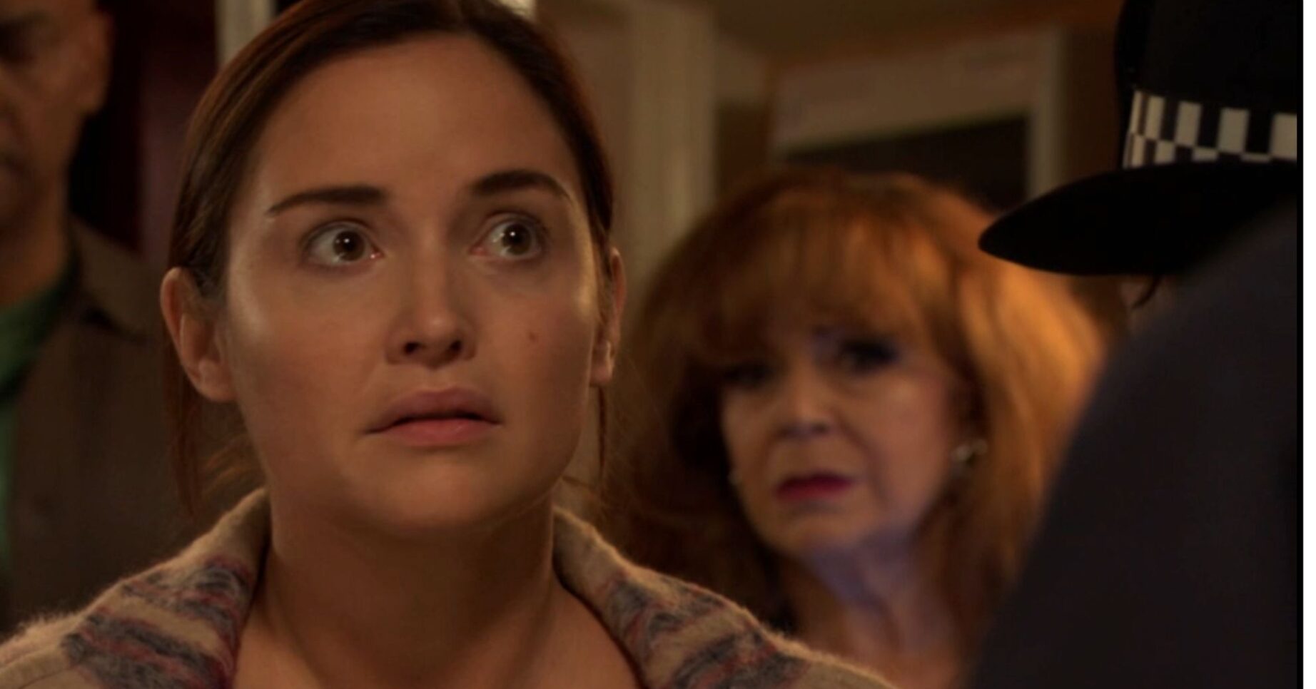 Lauren looks shocked on EastEnders (Credit: BBC)