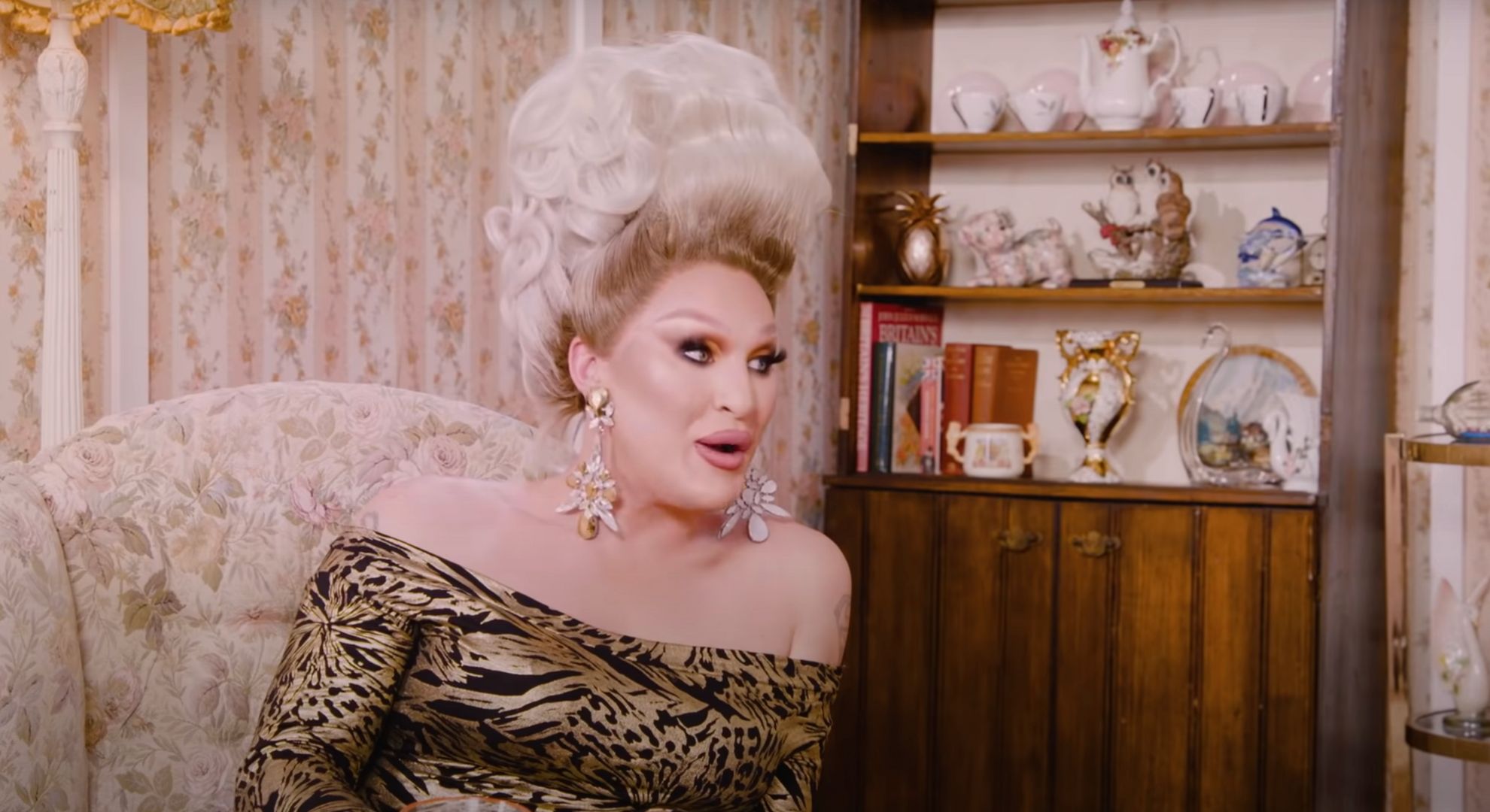 The Vivienne speaking in a living room