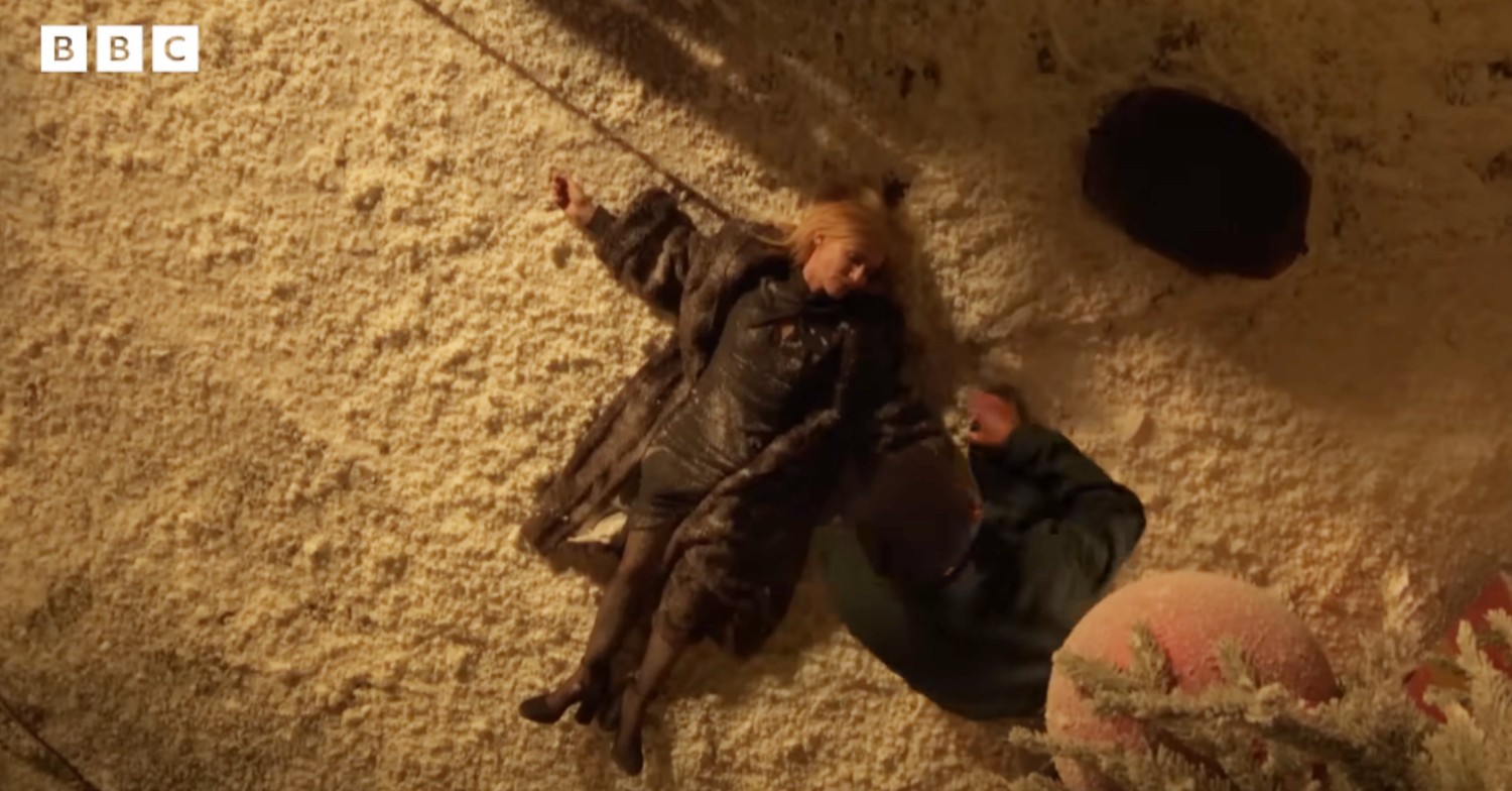 Cindy unconscious in the snow on EastEnders