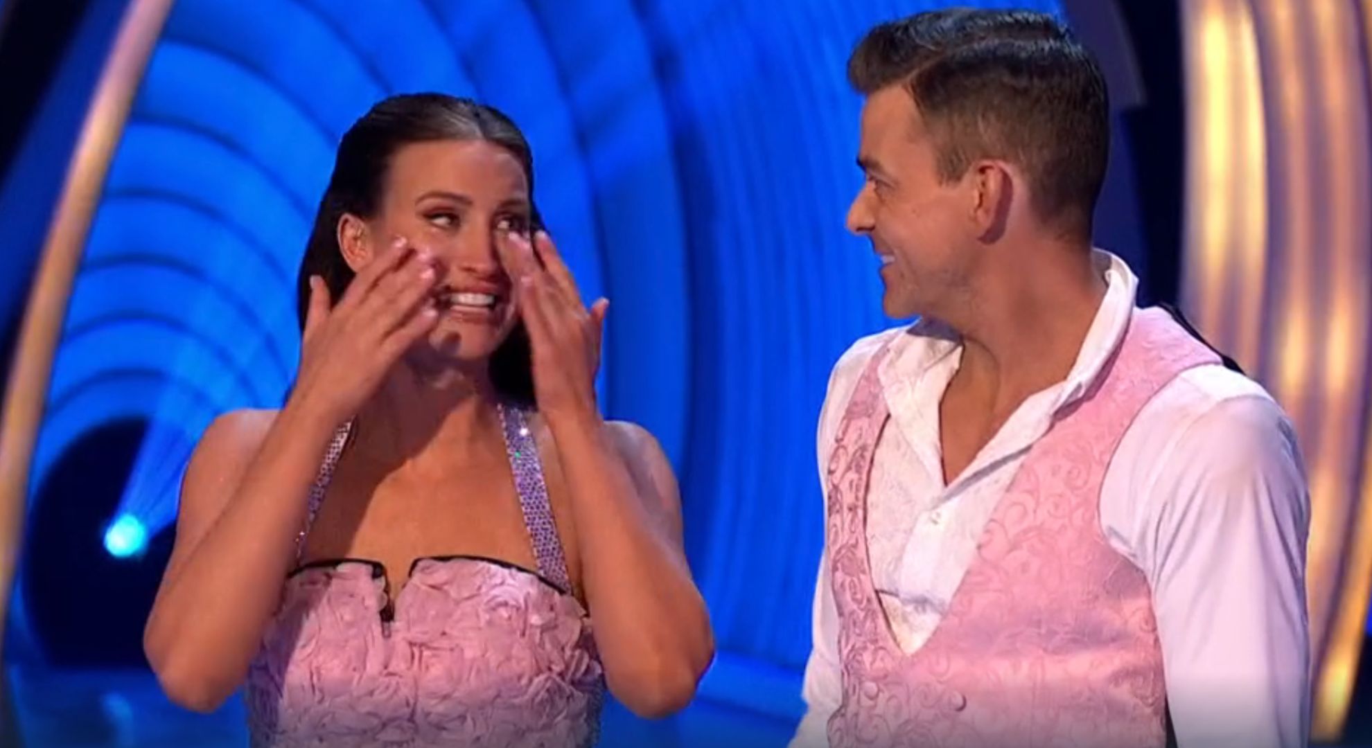 Ferne McCann crying as Brendyn Hatfield smiles on Dancing On Ice