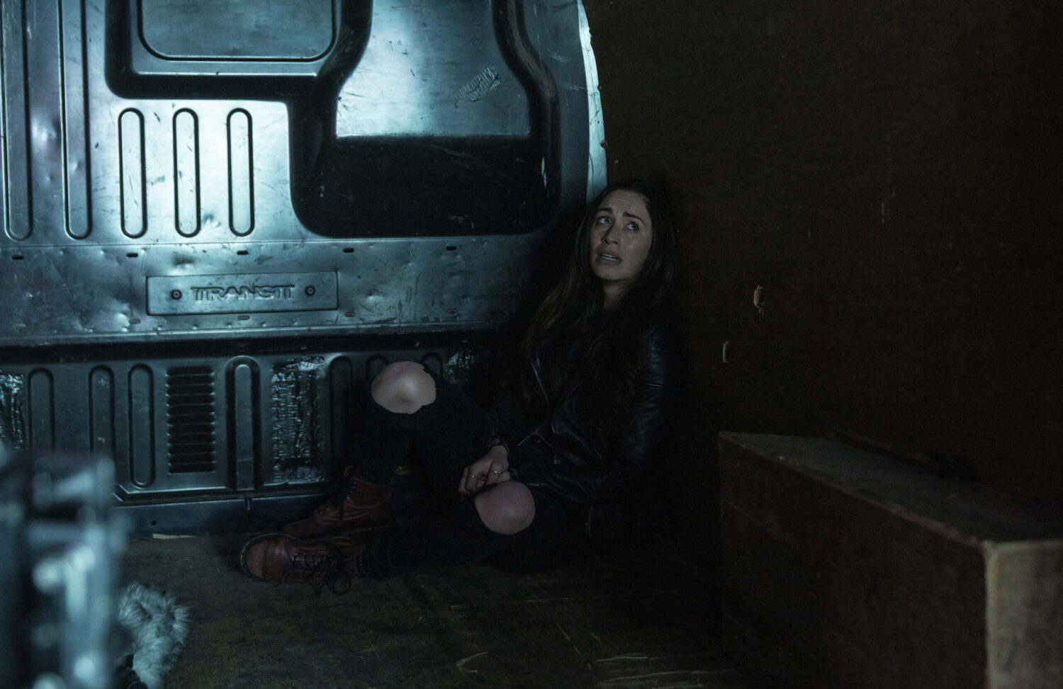 Shona in the back of a dark van