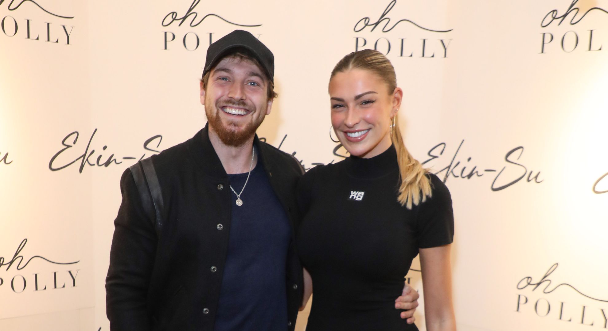 Sam Thompson and Zara McDermott smiling 