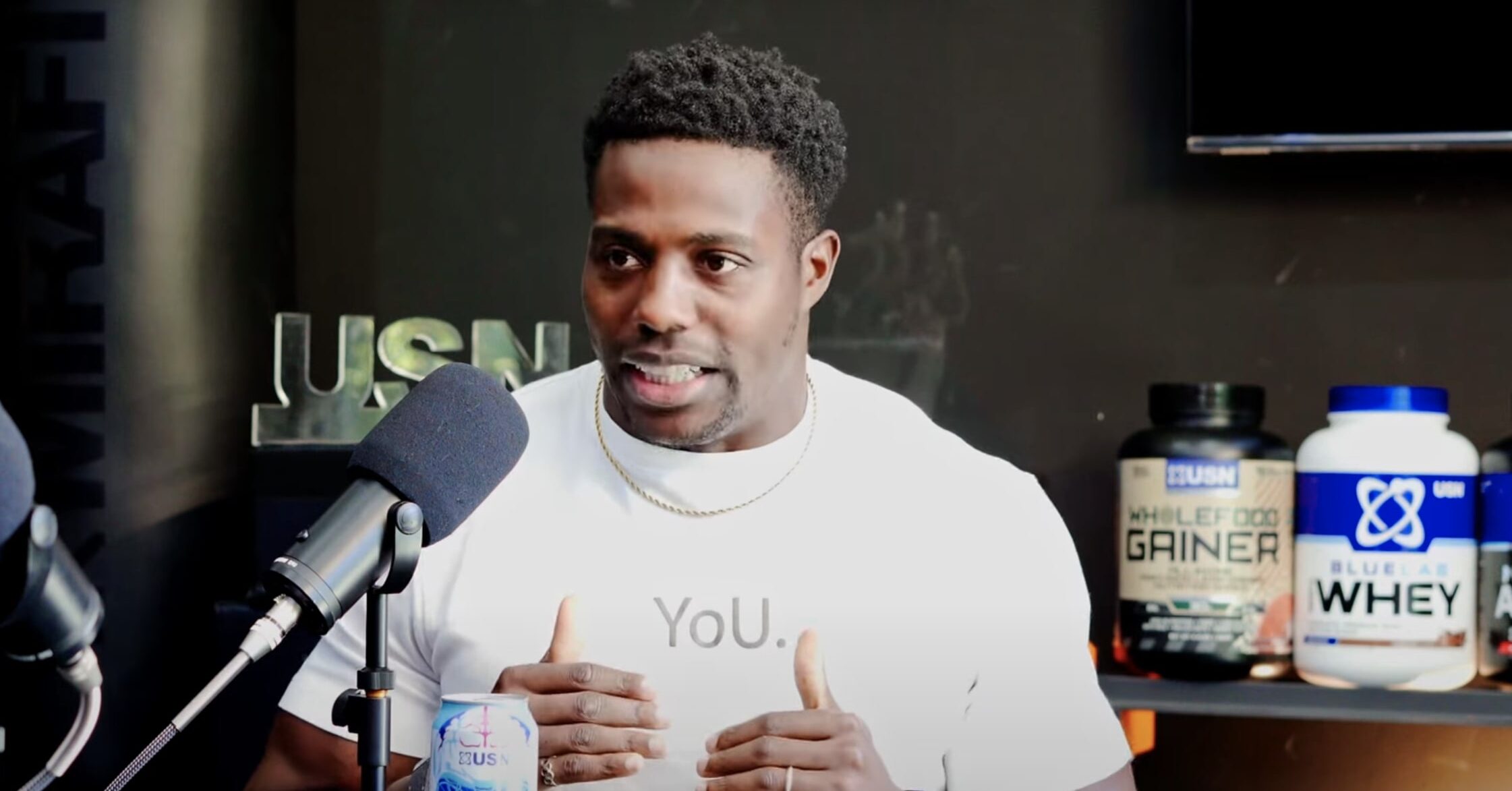 Harry Aikines-Aryeetey recording an episode of Harry's Gym Chat