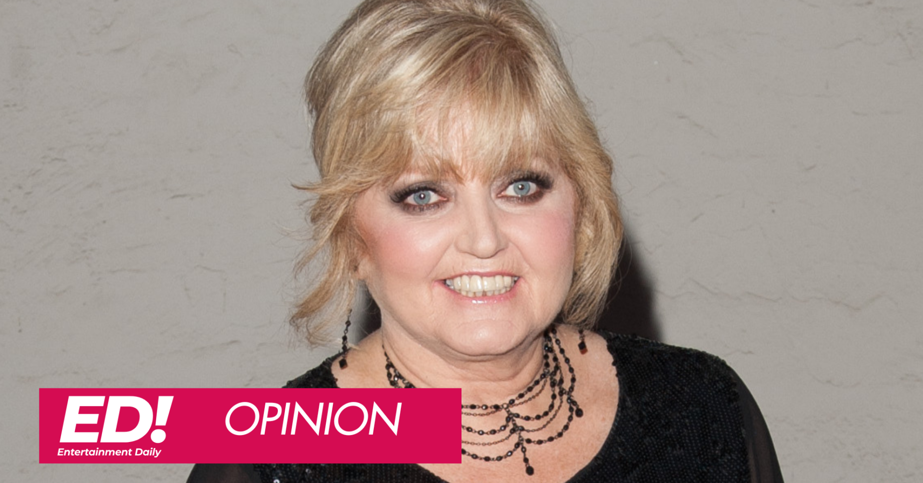 Linda Nolan smiling in a black top