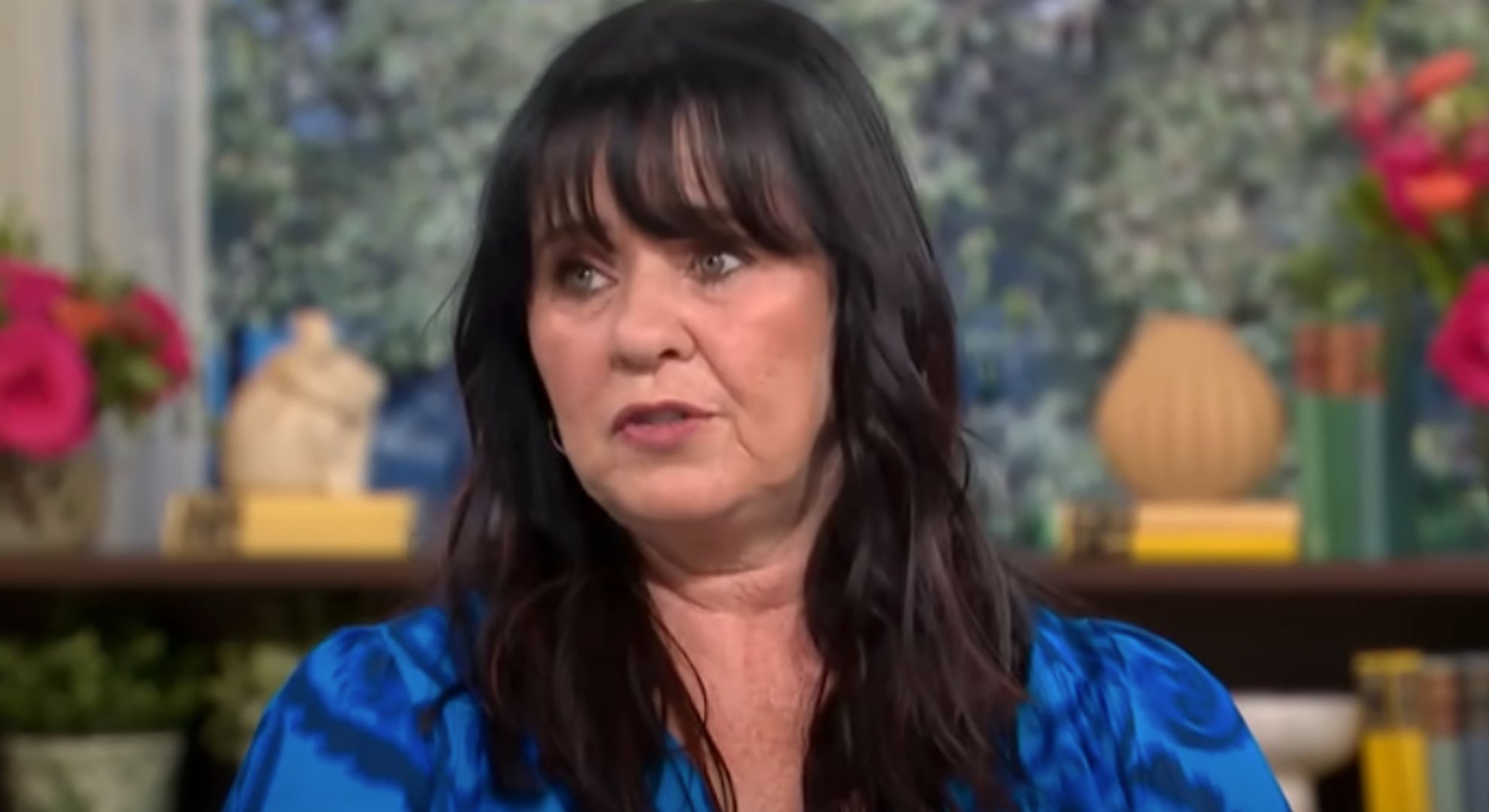 Coleen Nolan wears a blue shirt