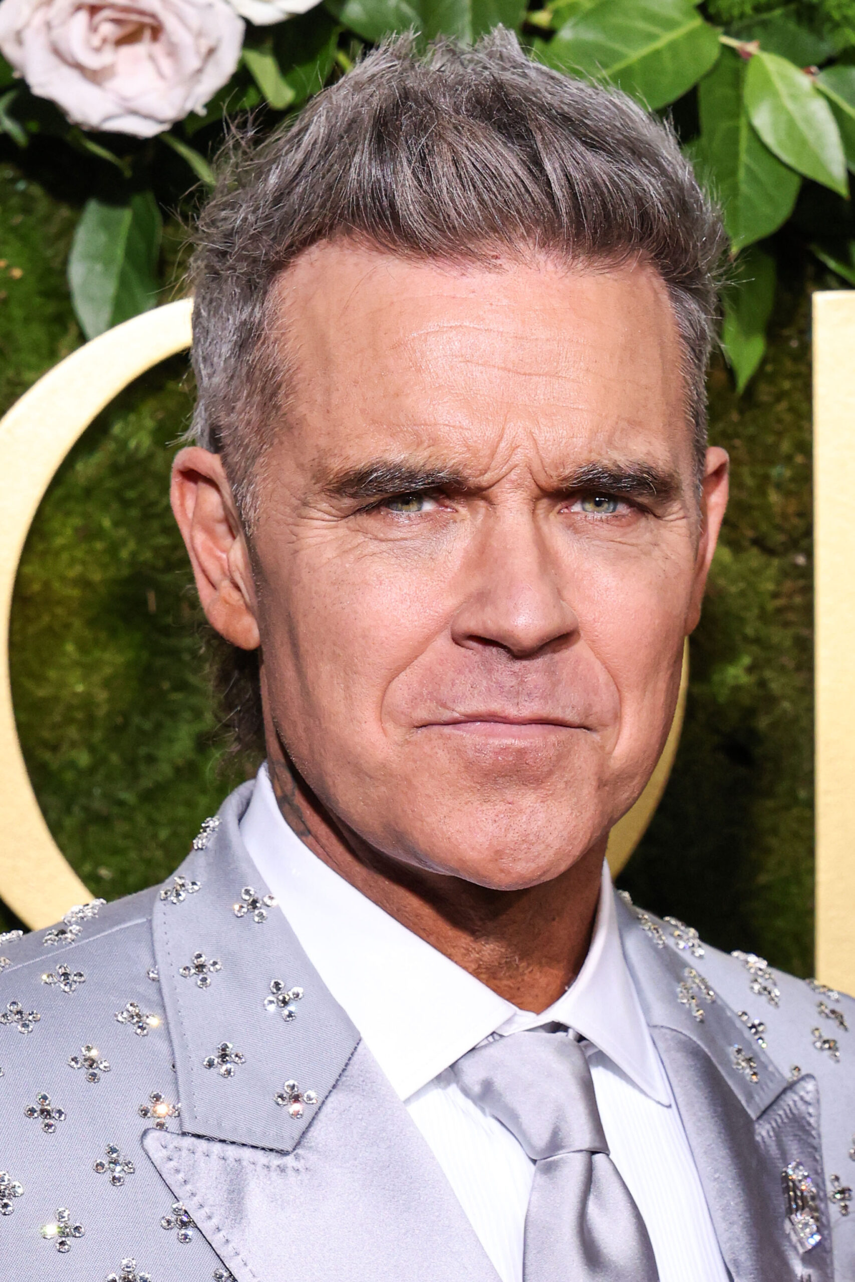 Robbie Williams gazing in front