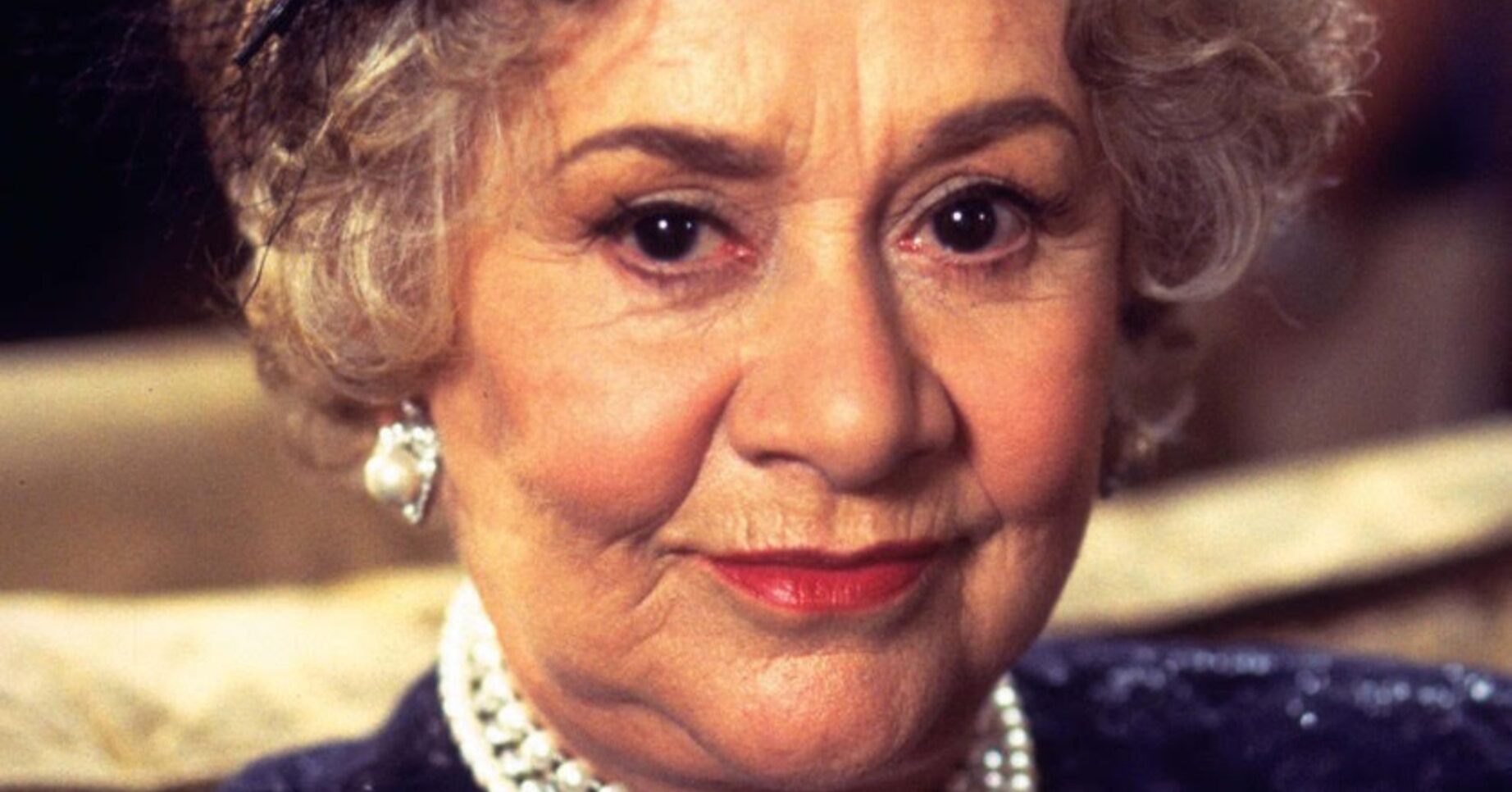 Joan Plowright smiling