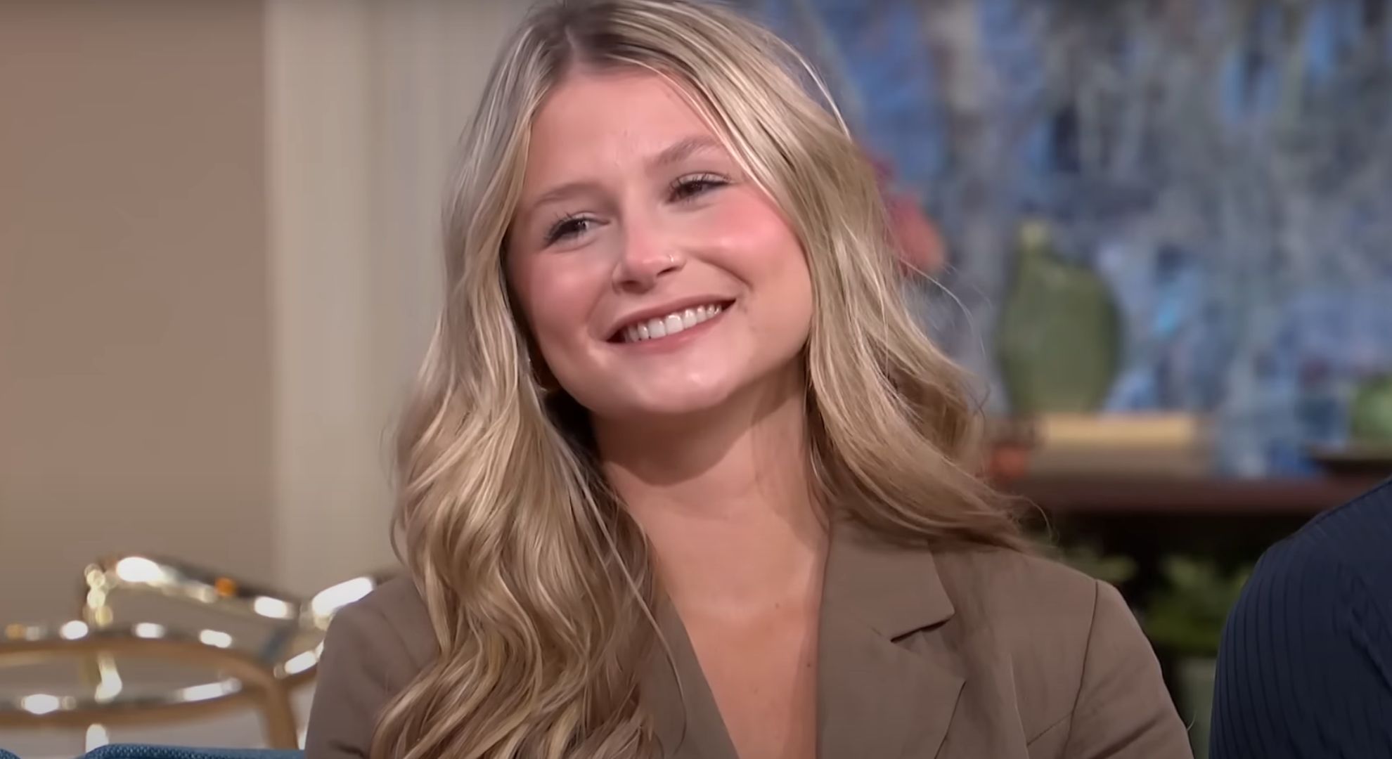 Mollie Pearce smiles while talking to This Morning hosts