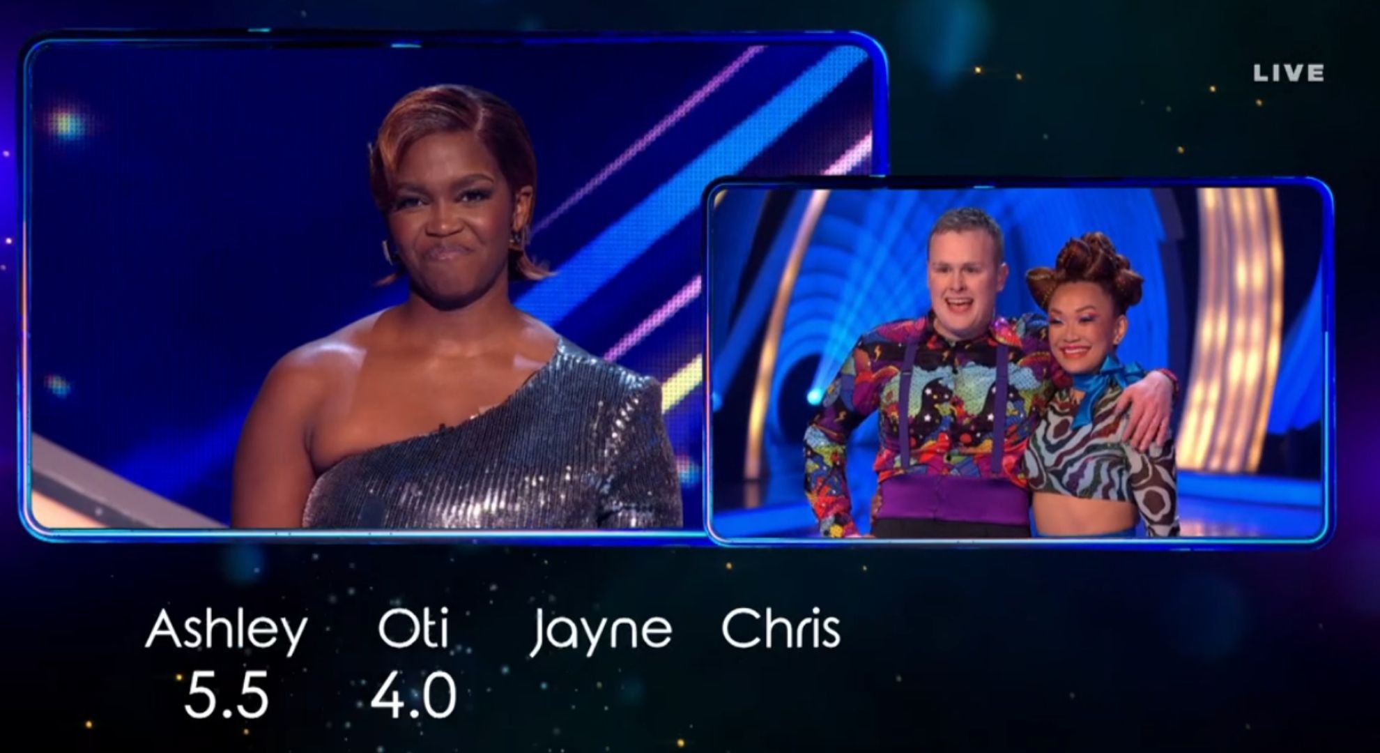 Screenshot from Dancing On Ice depicting Oti's score as she reacts to Josh's performance
