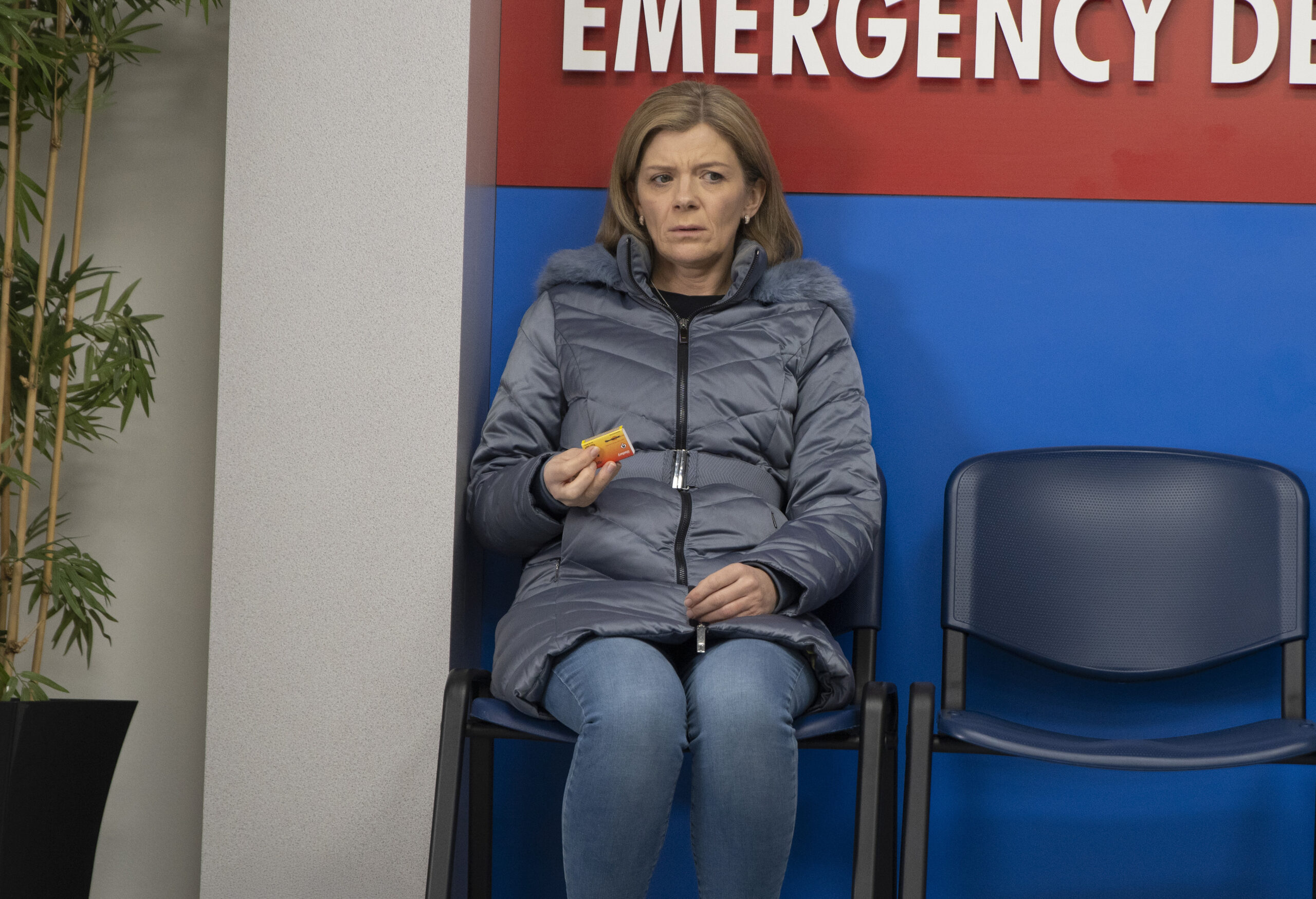 Coronation Street's Leanne is holding a box of matches at the hospital
