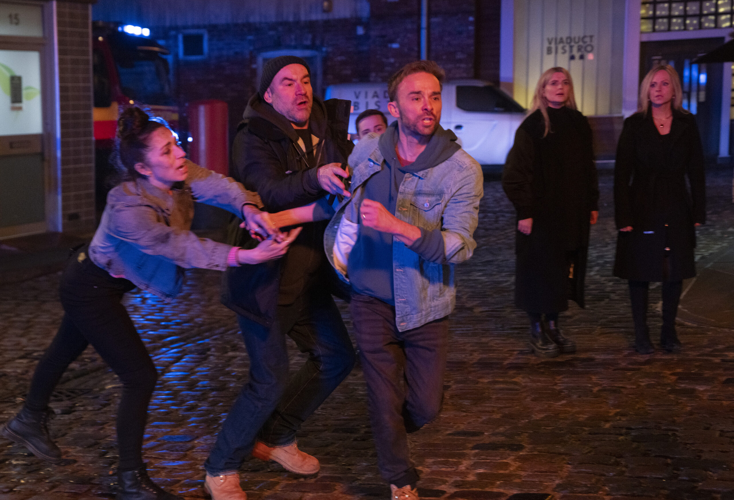 Shona and Tim pulling David back