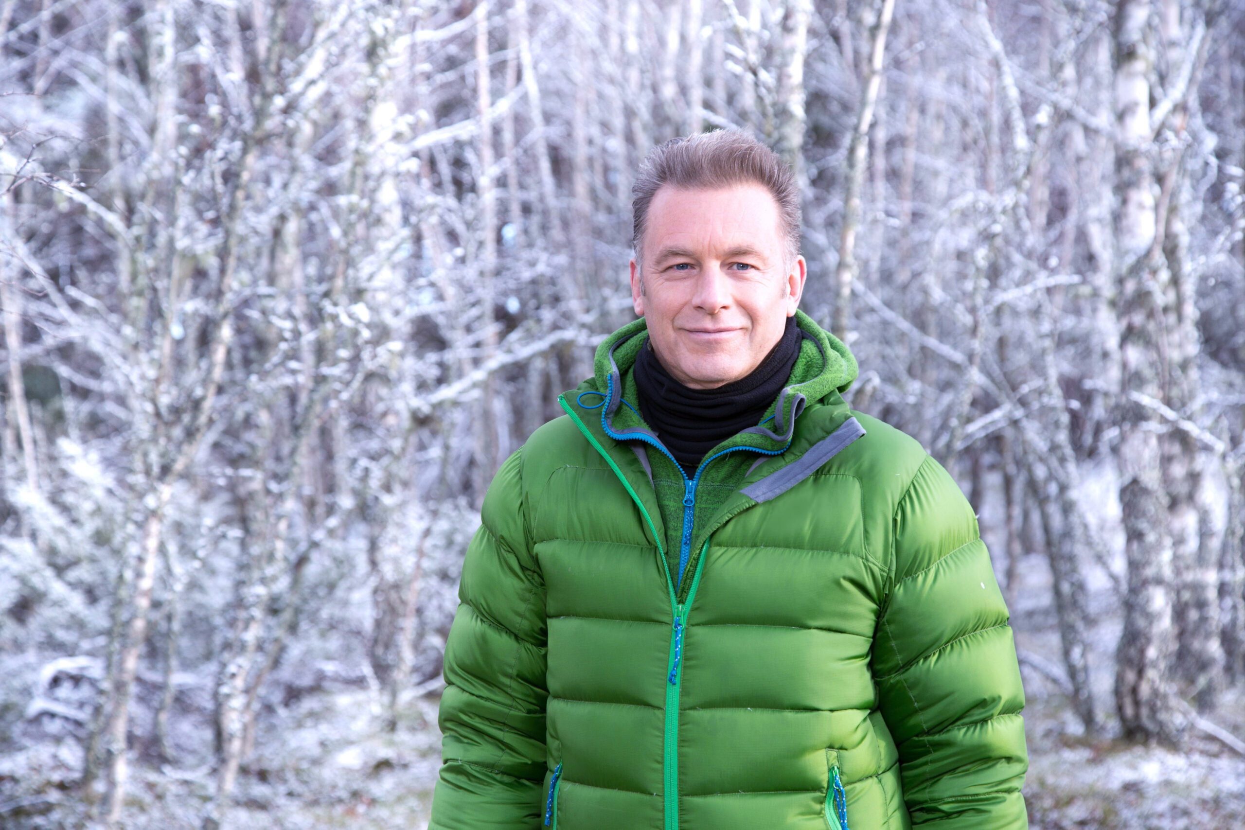 Chris Packham in a green jacket on Winterwatch