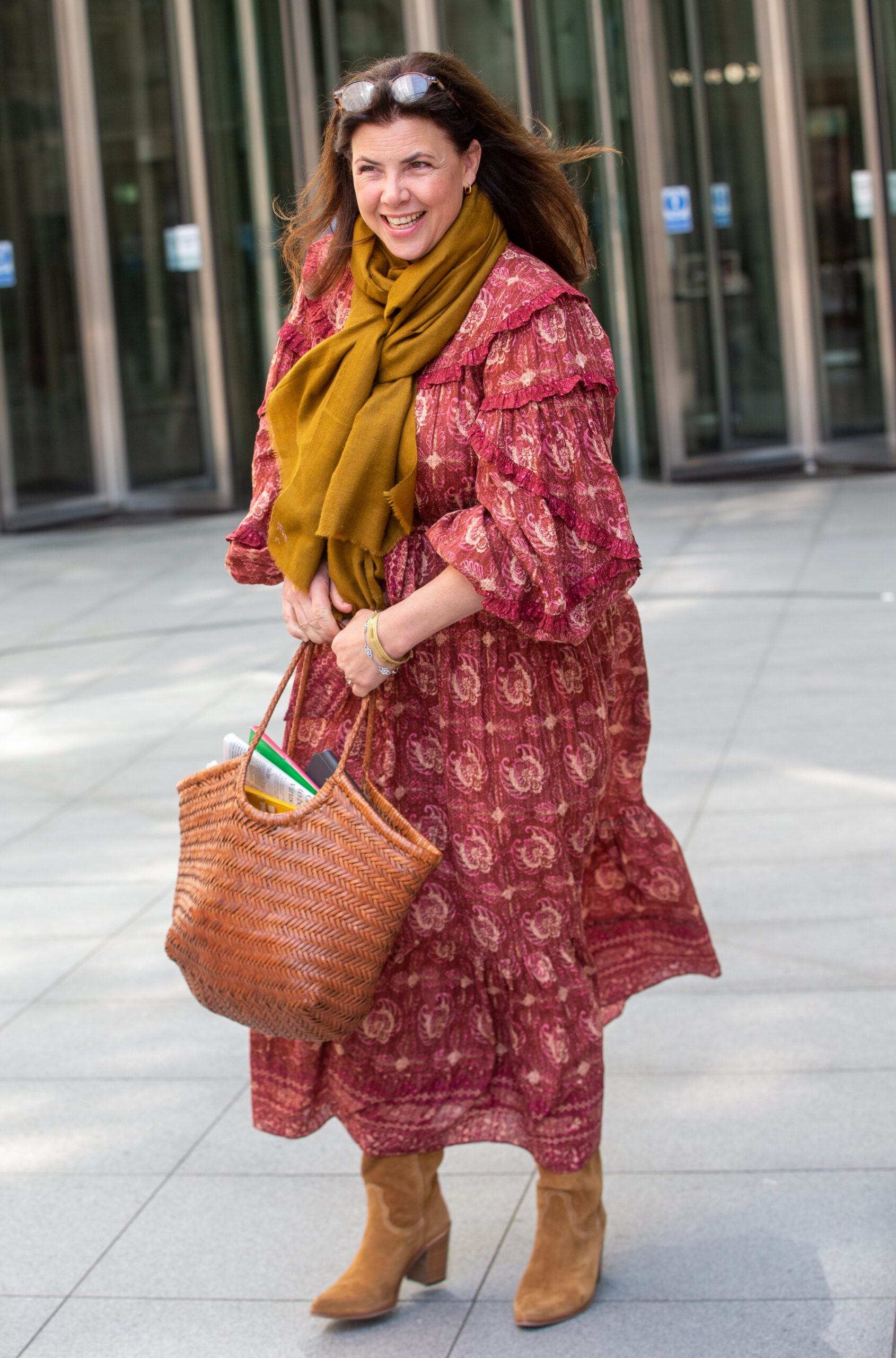 Kirstie Allsopp walking and smiling