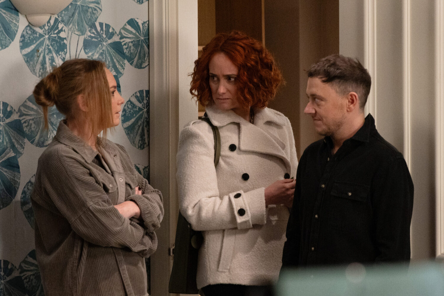 Amy and Matty talking to a social worker on Emmerdale