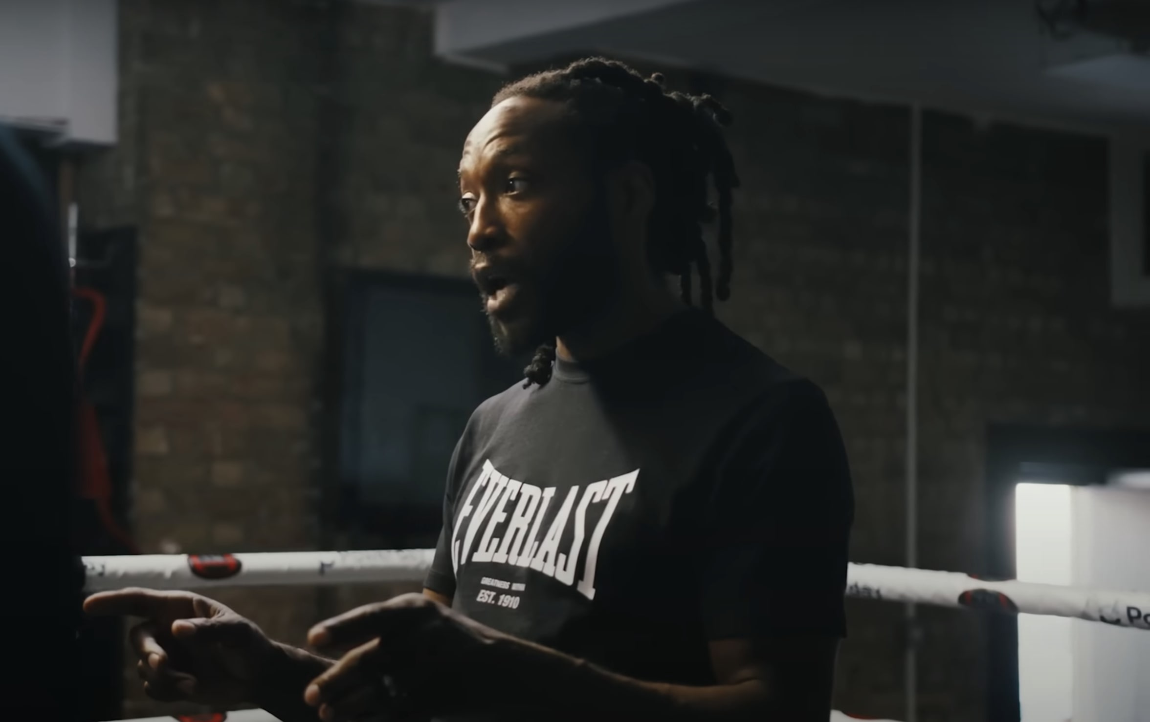 Marcus Luther in the boxing ring as a trainer