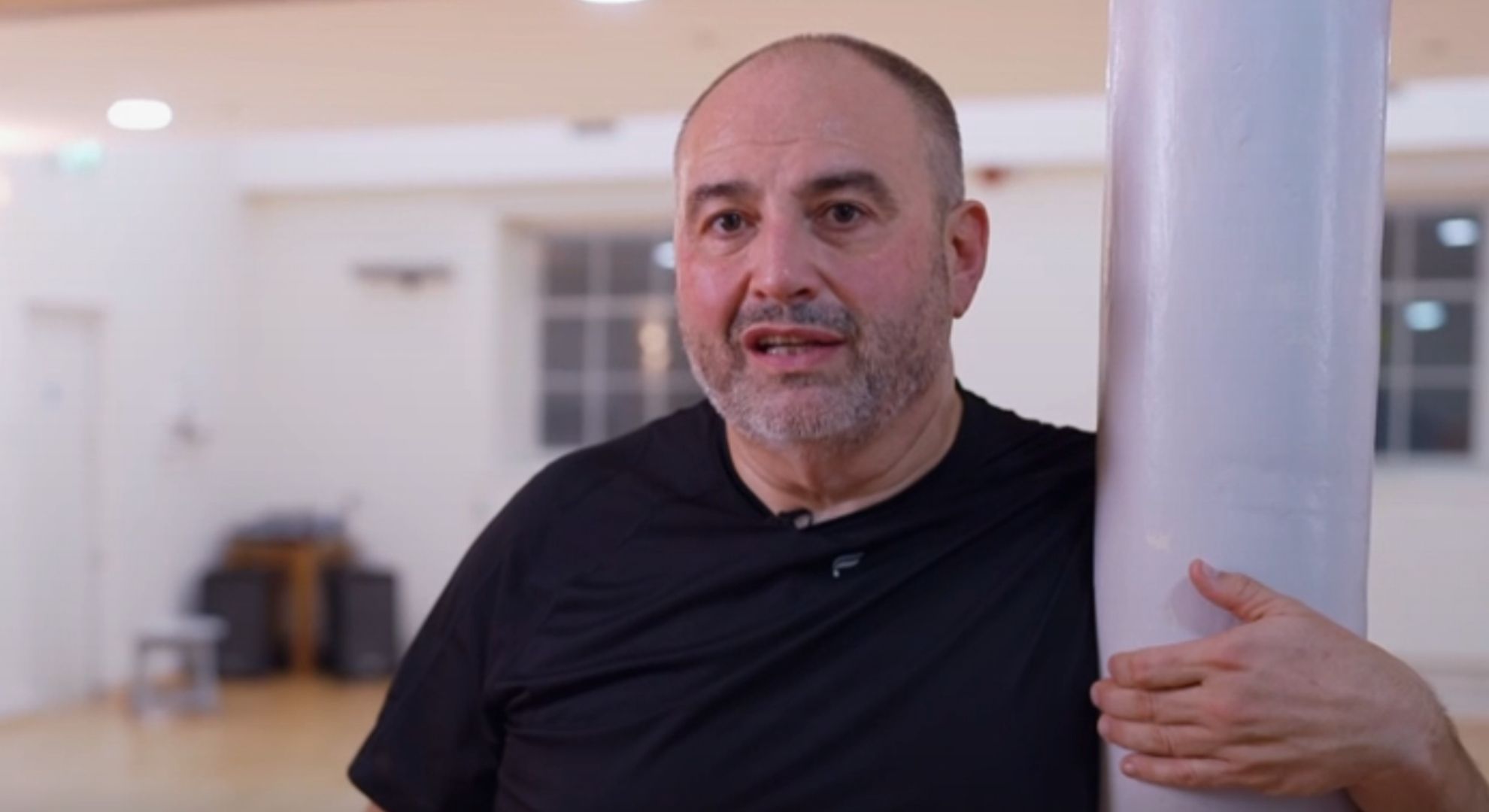 Wynne Evans stood next a pole on Strictly