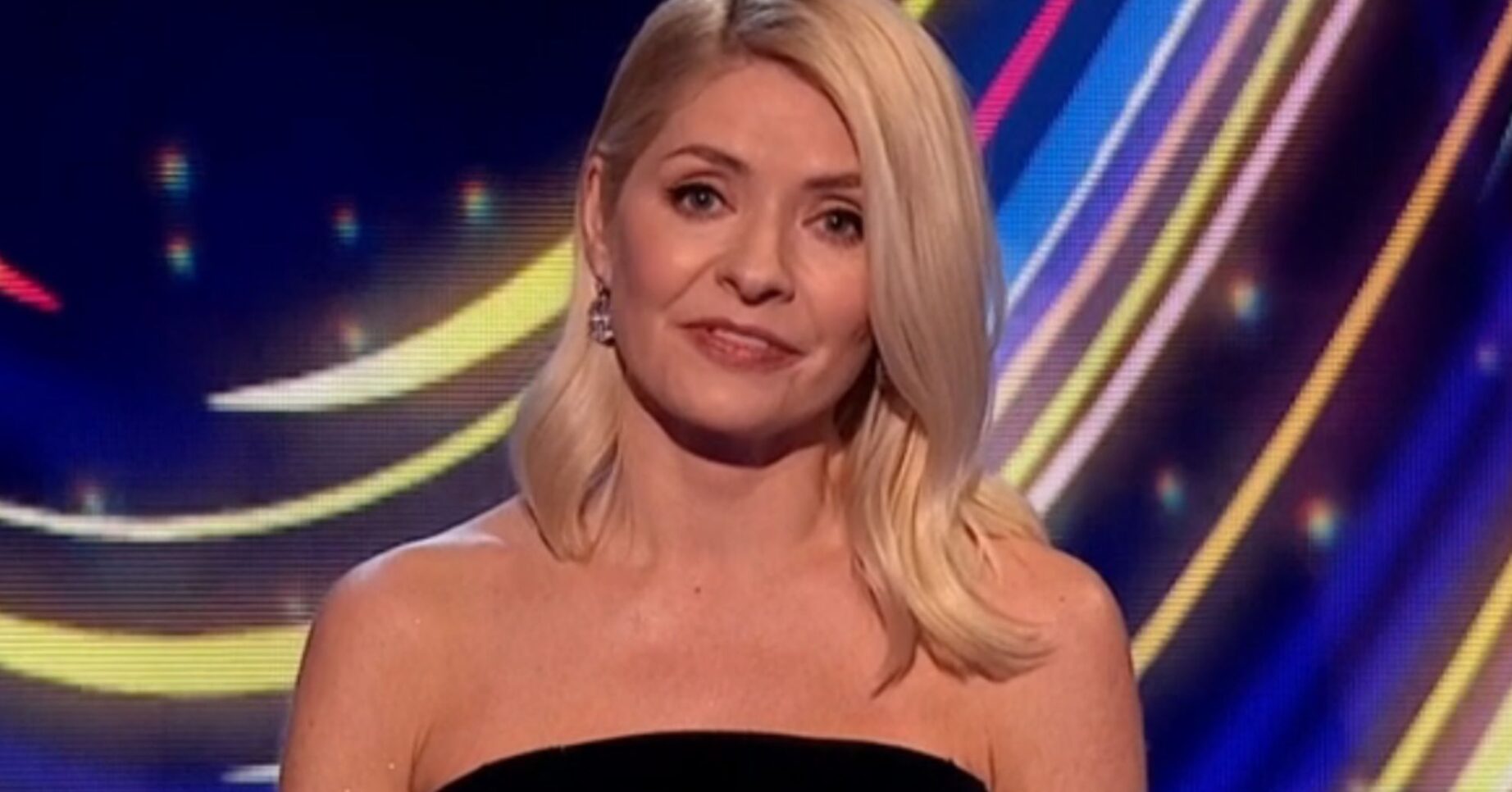 Holly Willoughby smiling slightly on Dancing On Ice tonight
