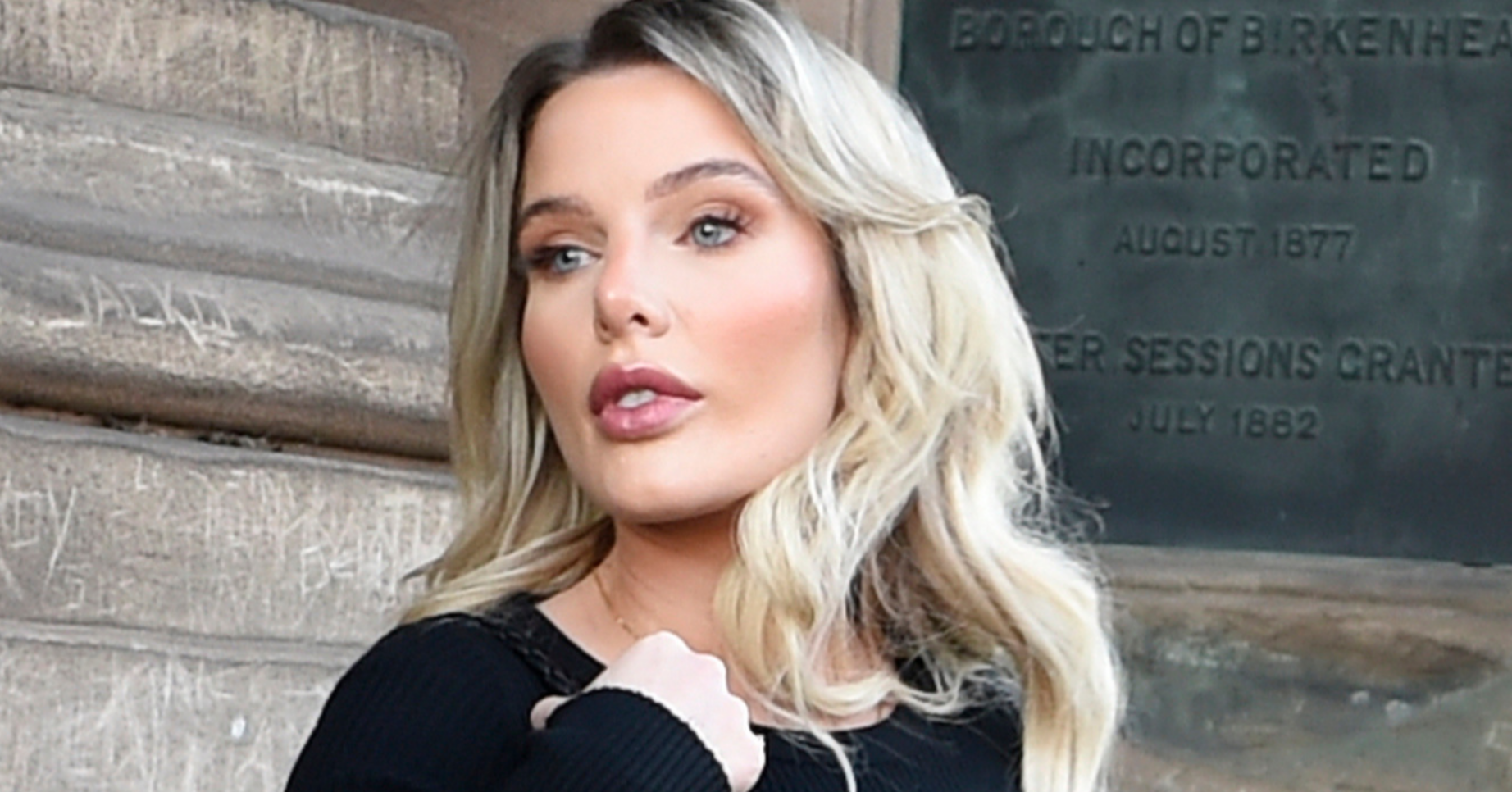 Helen Flanagan outside court in a black dress