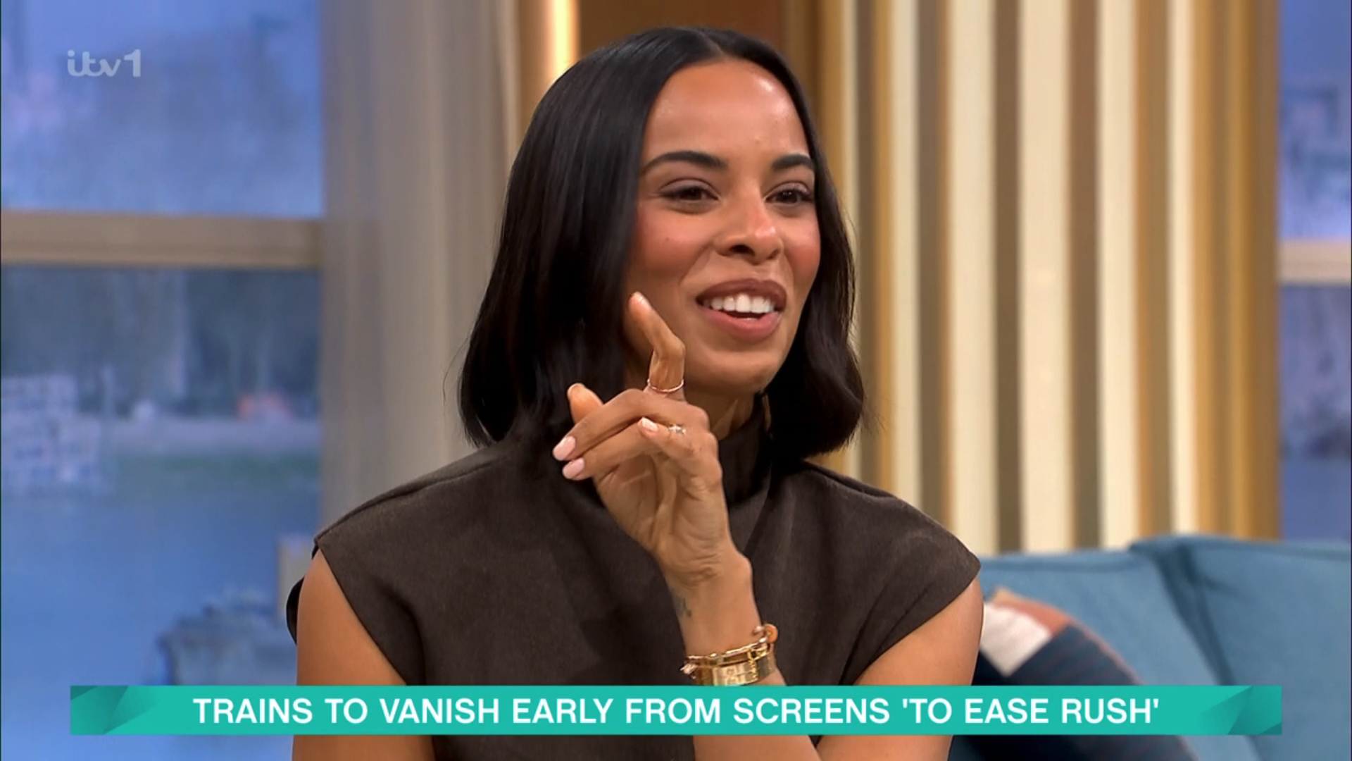 Rochelle Humes smiling and pointing on This Morning