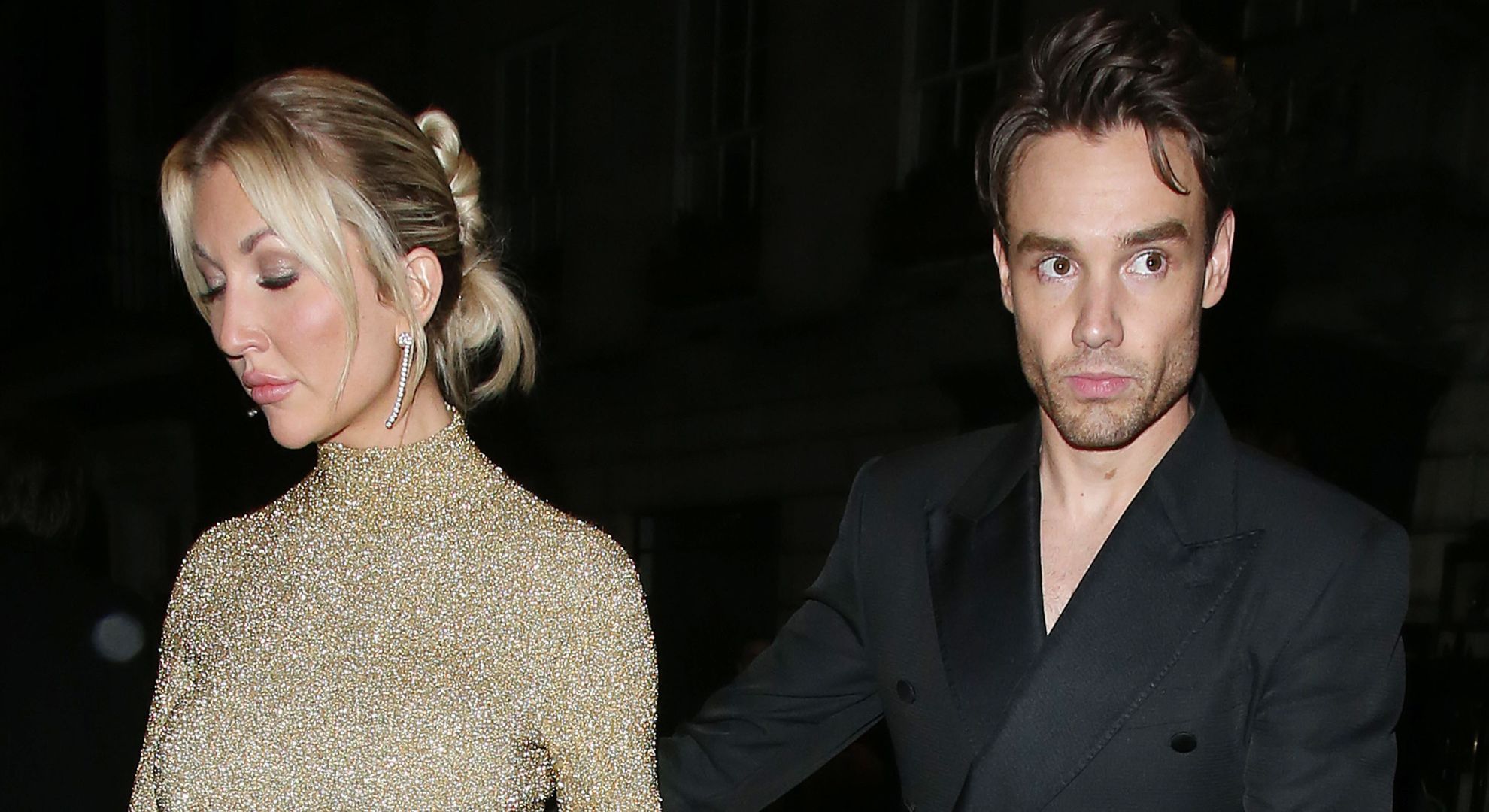 Kate Cassidy and Liam Payne together frowning