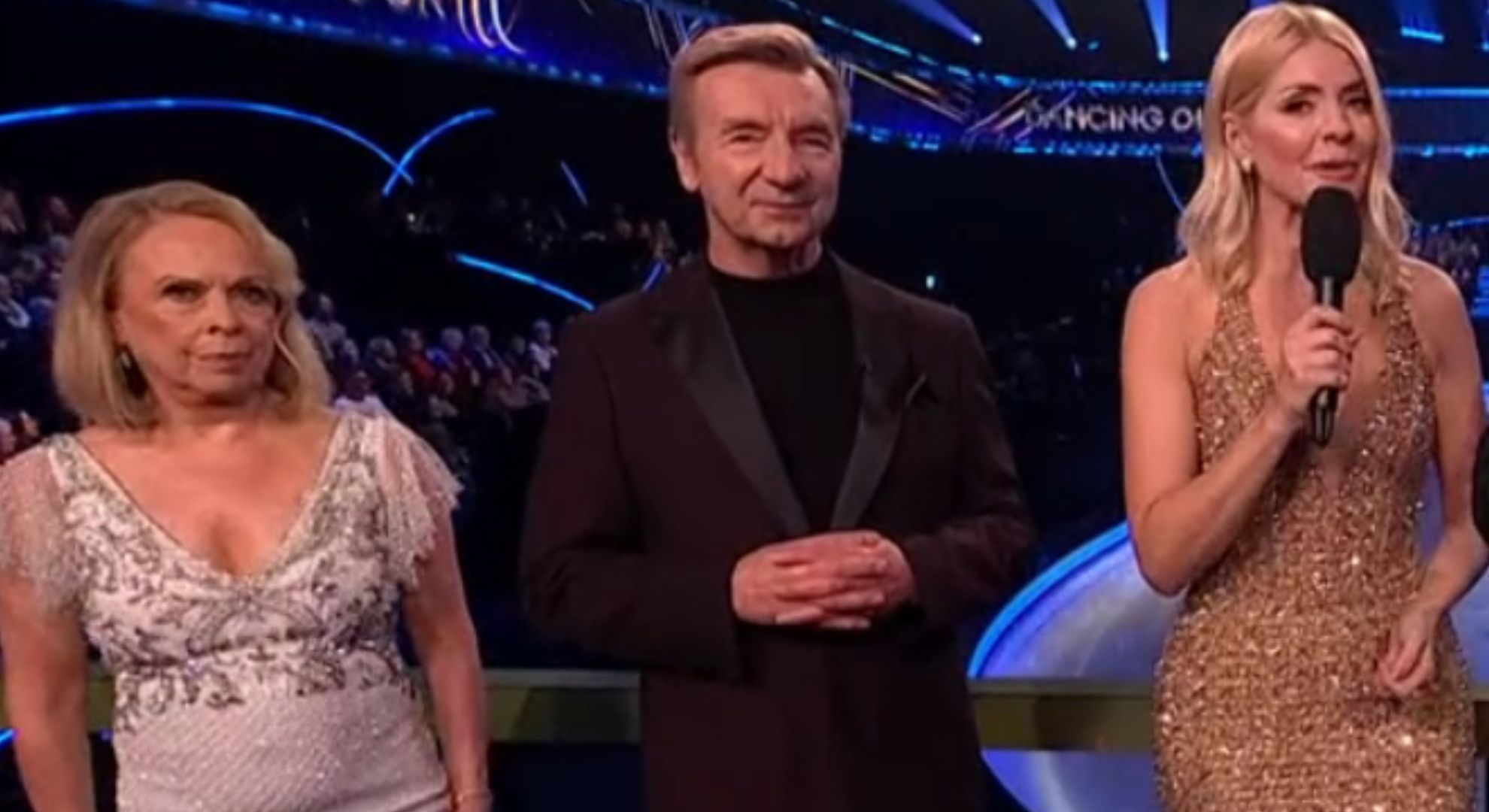 Jayne Torvill, Christopher Dean and Holly Willoughby looking front