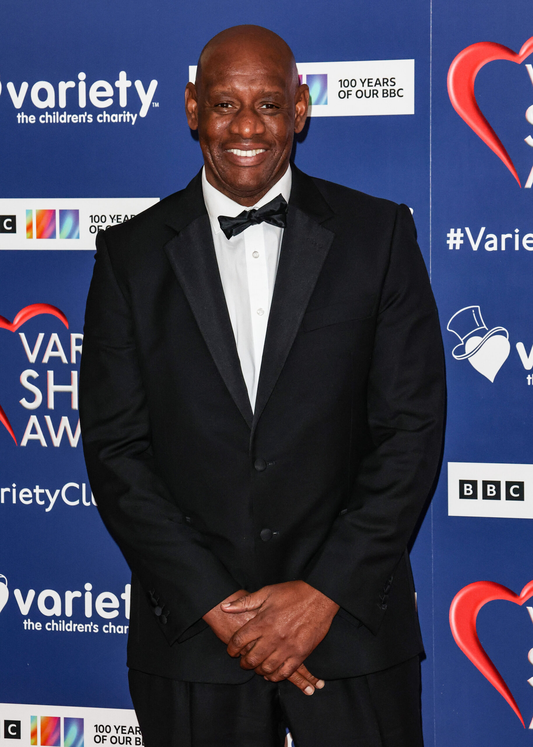 Shaun Wallace smiling on the red carpet