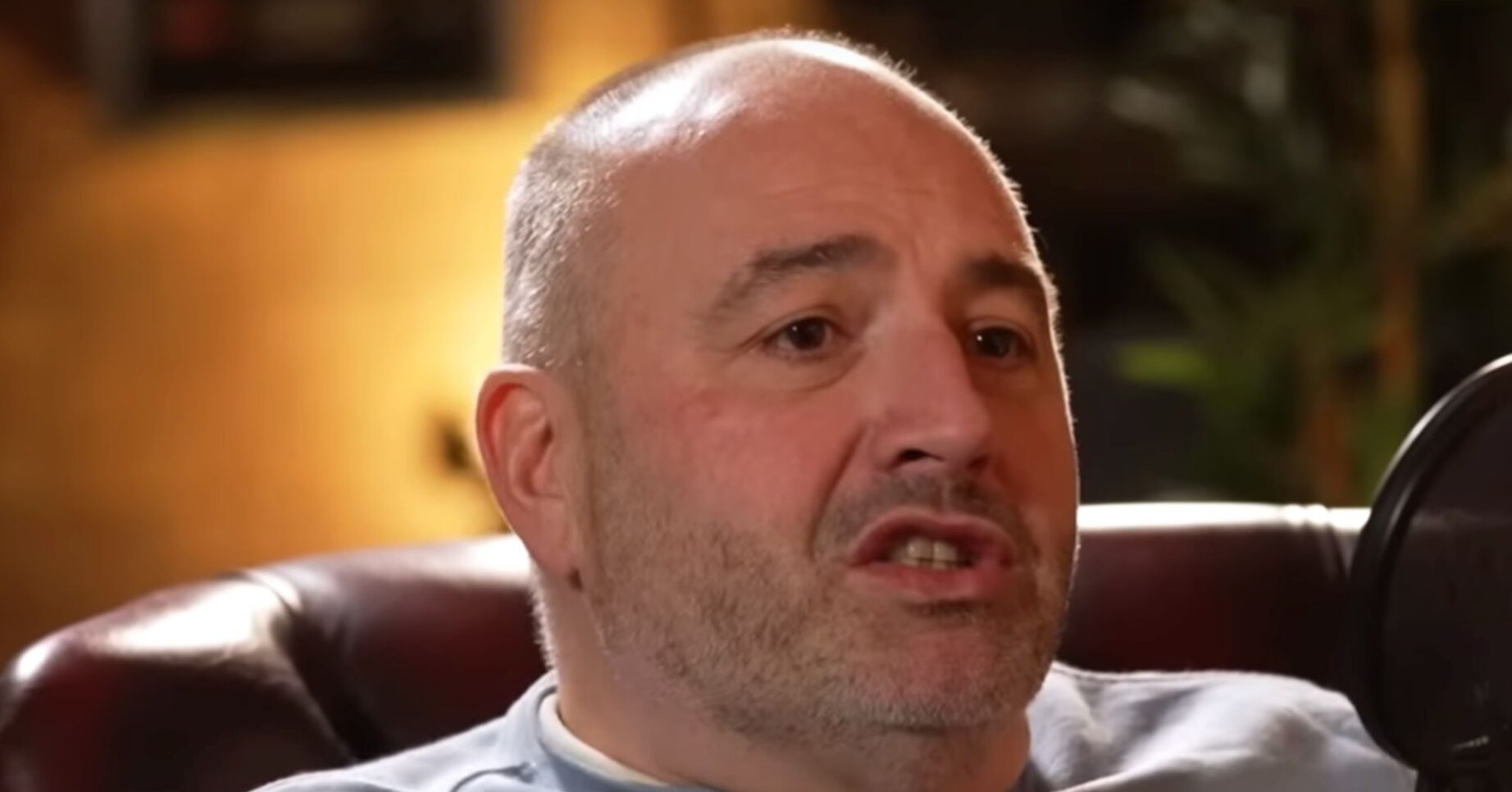 Wynne Evans speaking on a podast