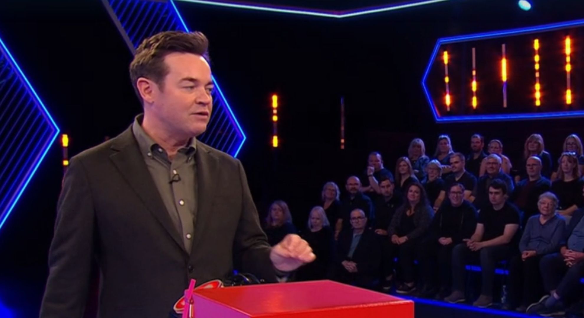 Stephen Mulhern looking to his left 